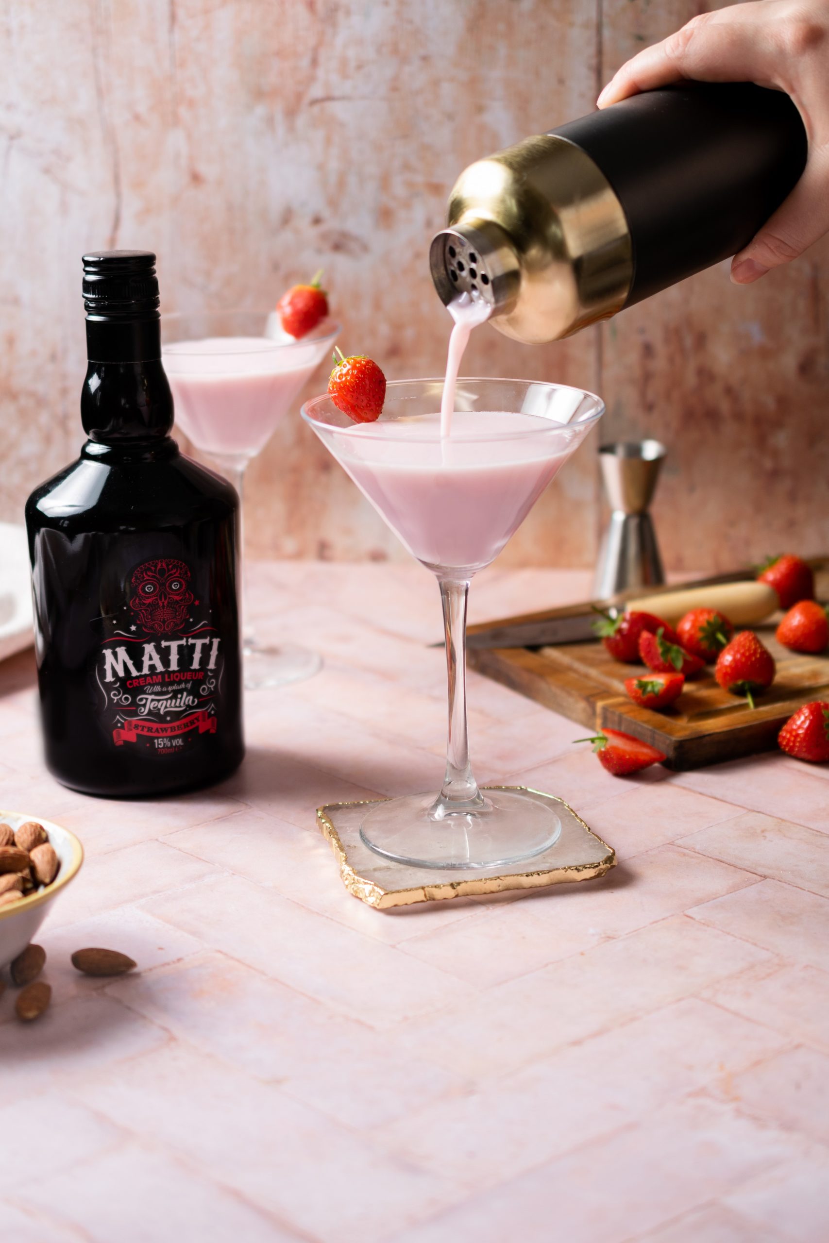 glasses of strawberry cream liqueur