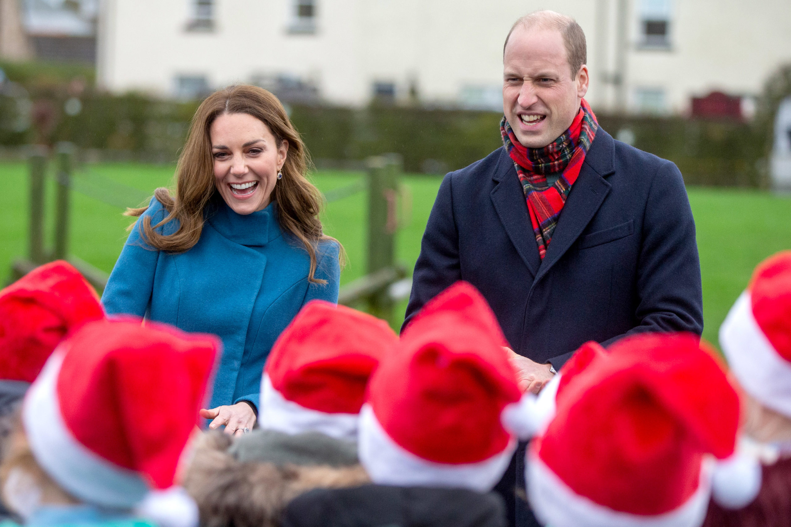 William and Kate out and about with children in Santa hats