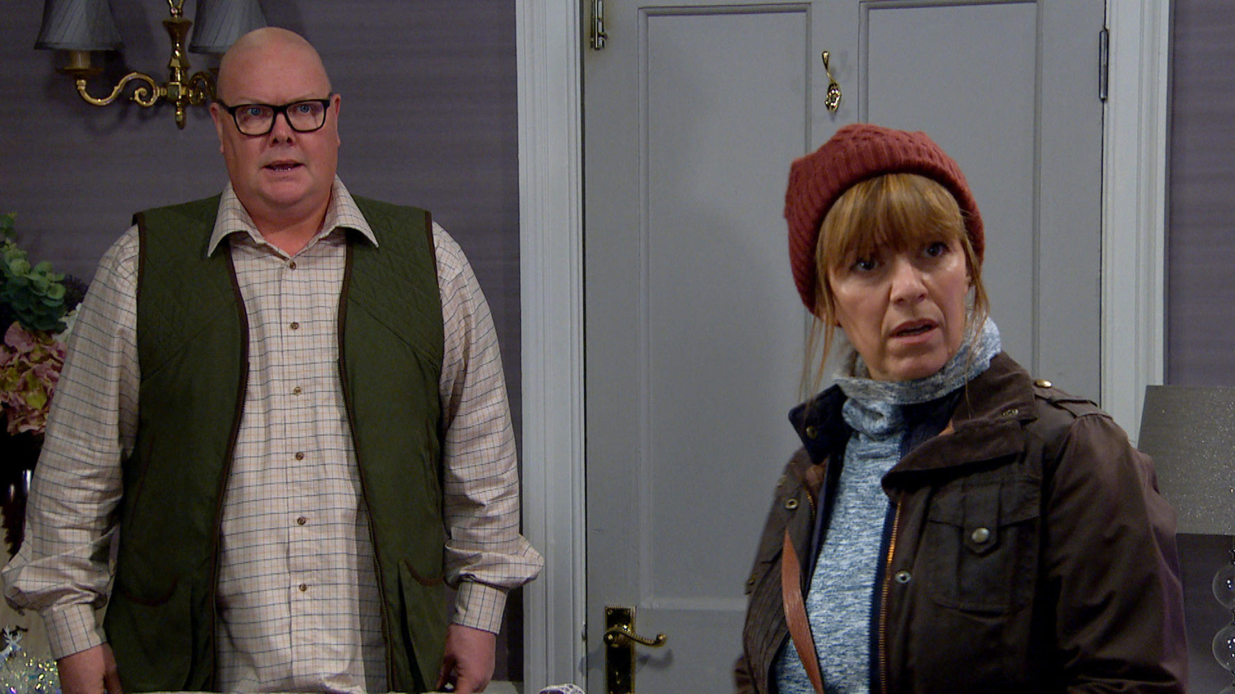 Paddy and Rhona looking anxious in Emmerdale