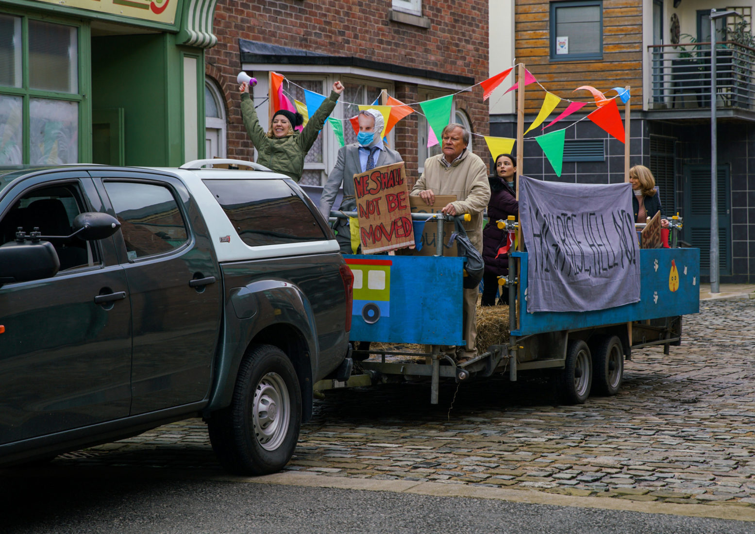 The residents protest in Coronation Street