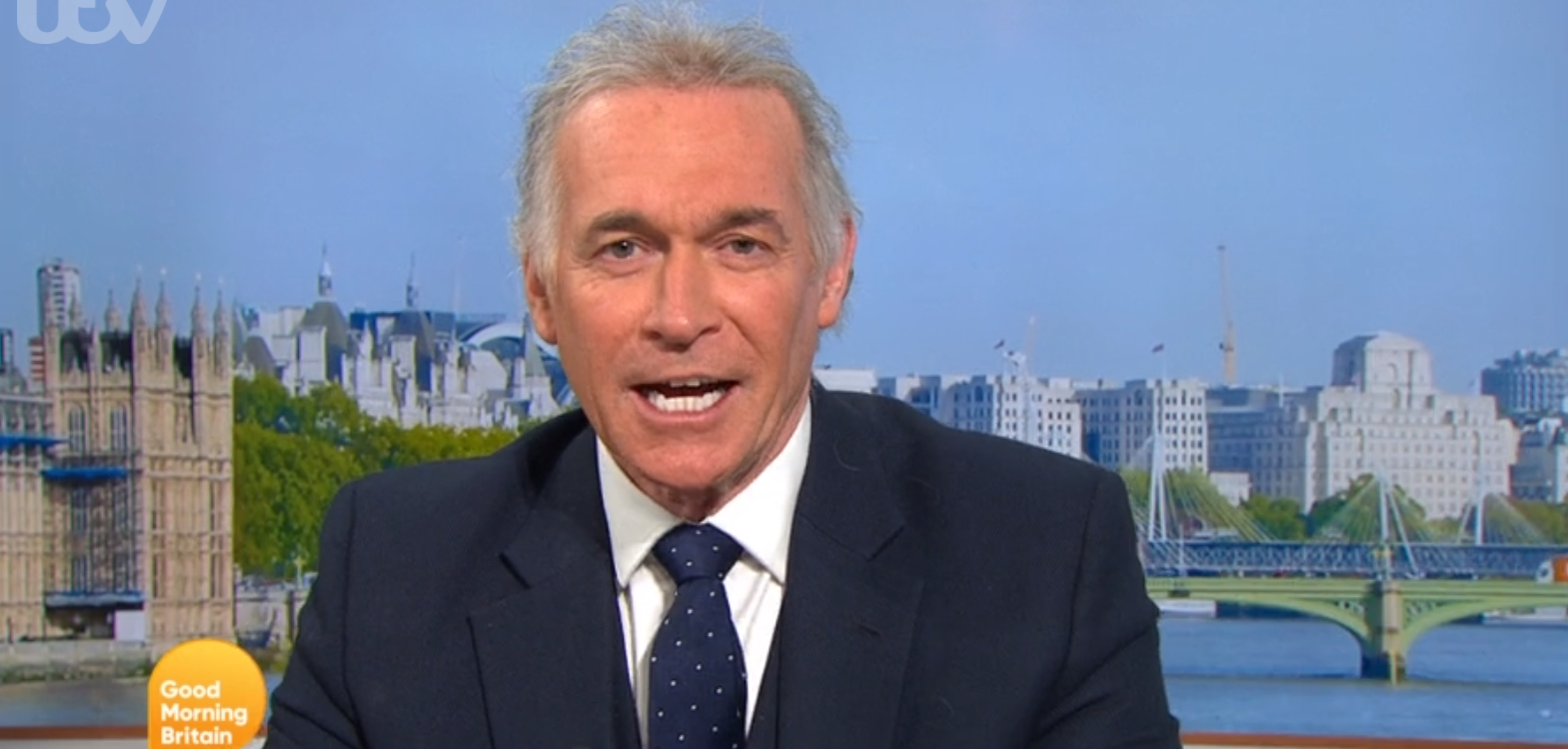 Dr Hilary apologises for not wearing face mask