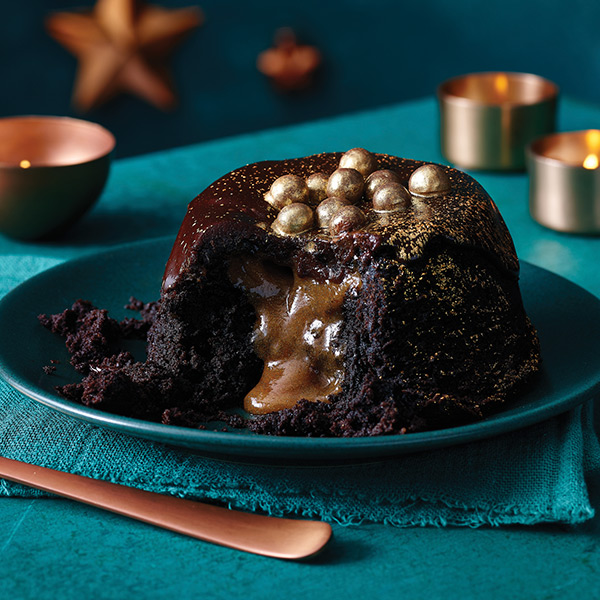 lifestyle shot of melt in the. middle christmas pudding