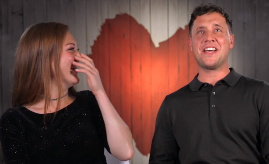 Holly and Shane laughing after their date in the First Dates Christmas special