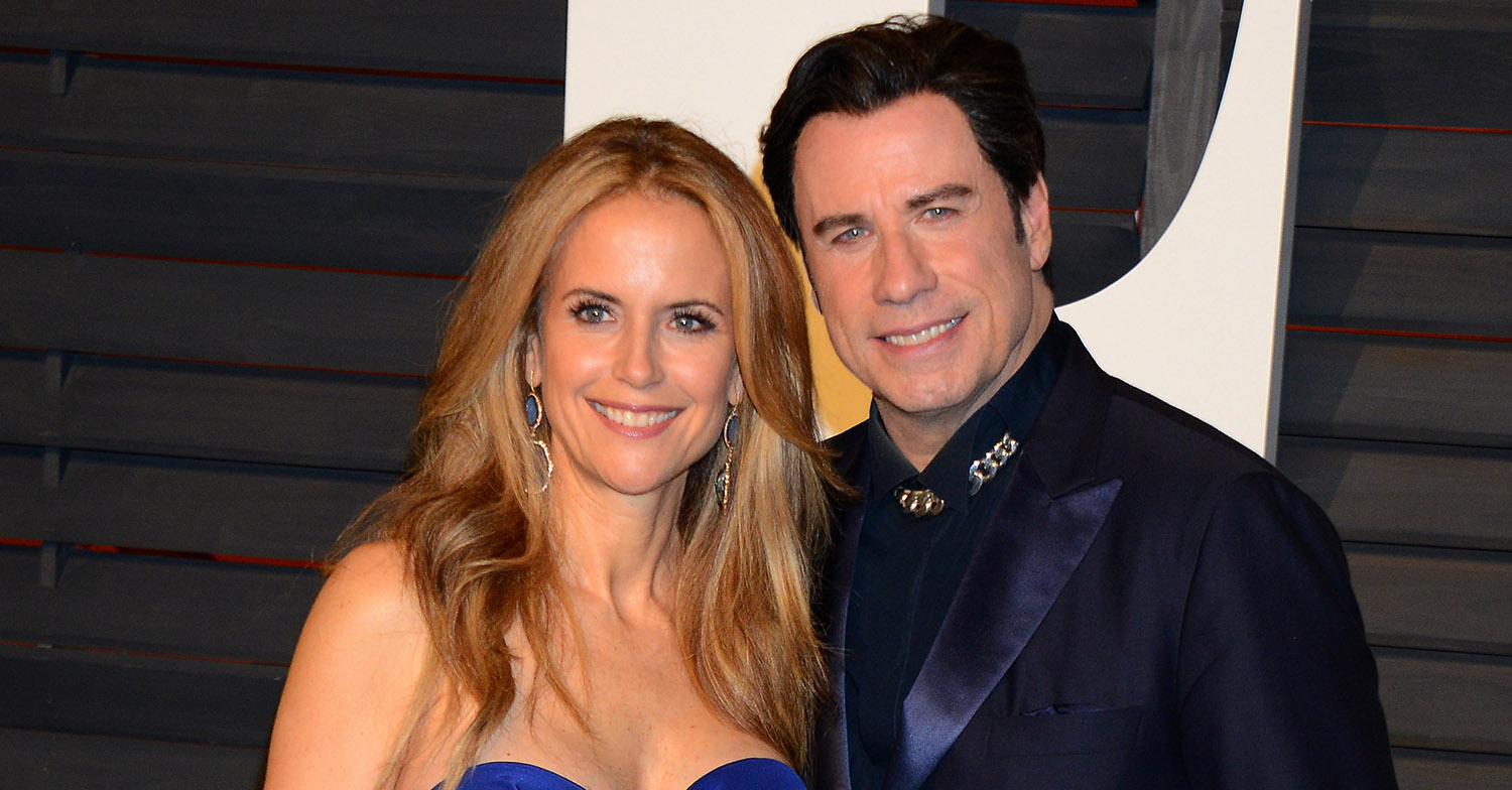 john travolta and kelly preston on the red carpet