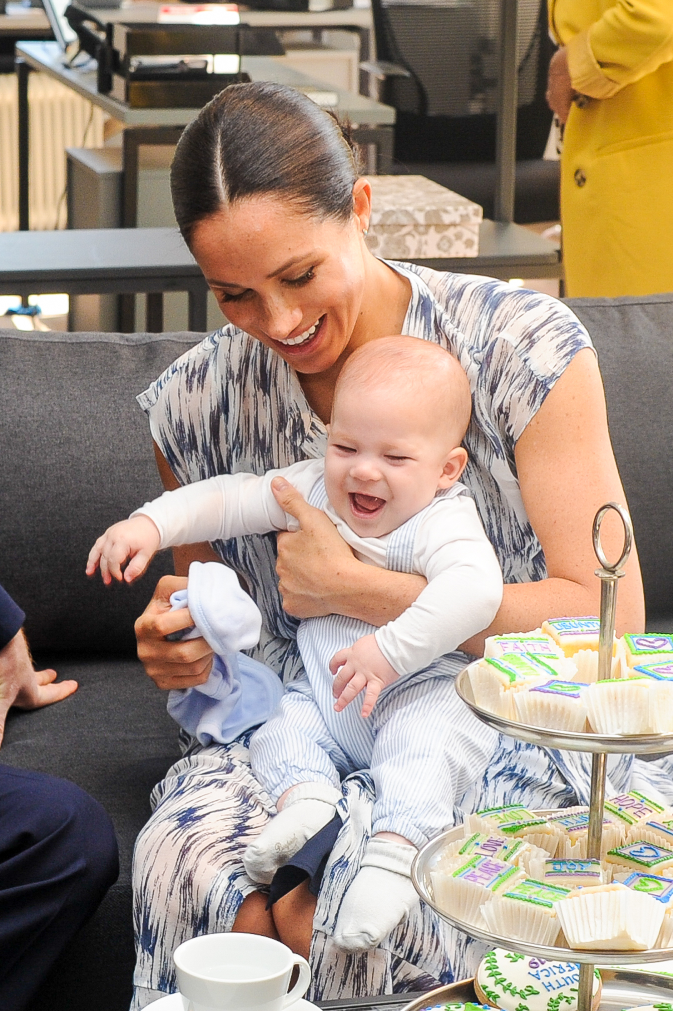 baby Archie sitting on Meghan's lap