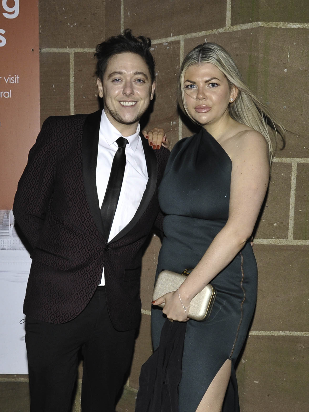 Ash Palmisciano and Shea Rowen smile for red carpet photo