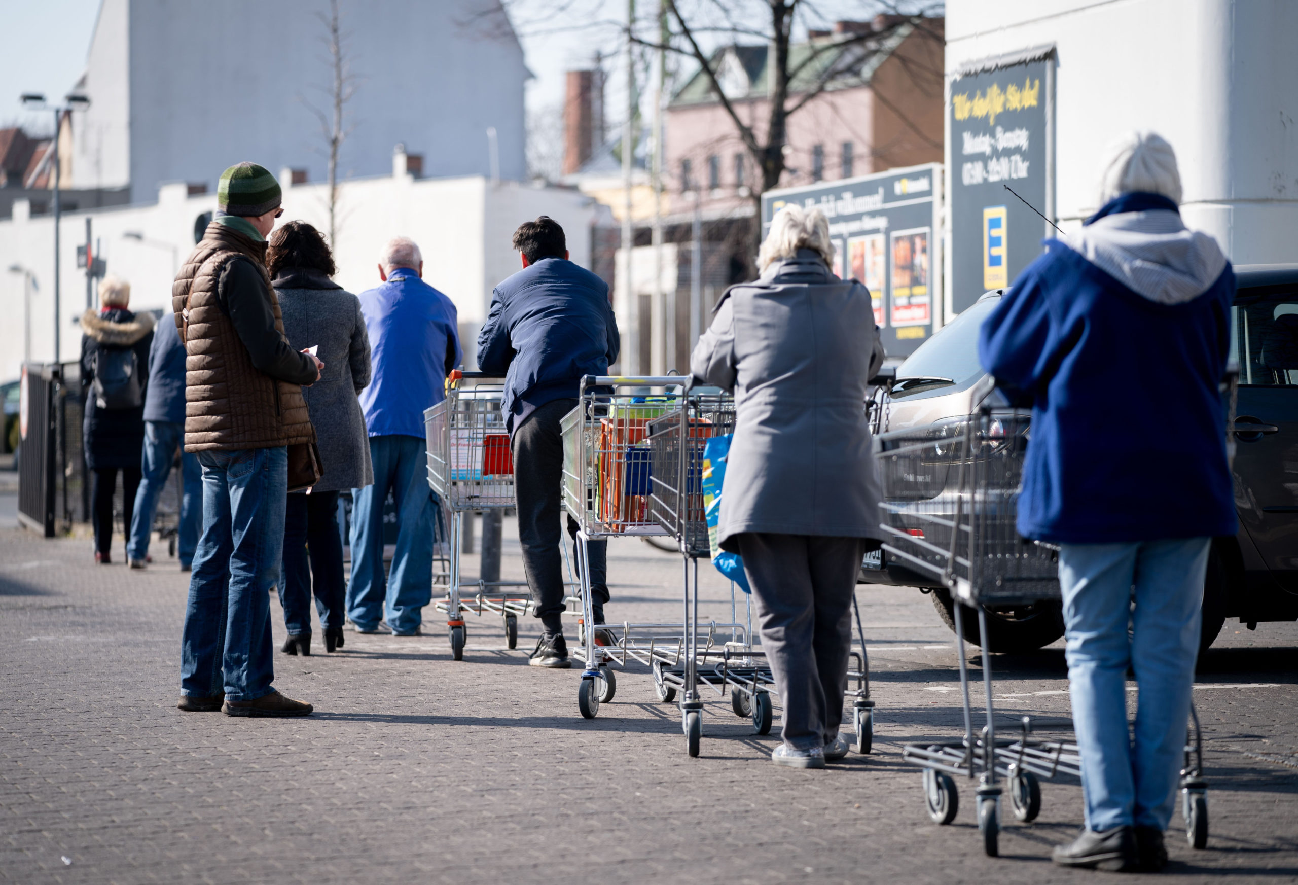 queues outside supermarkets
