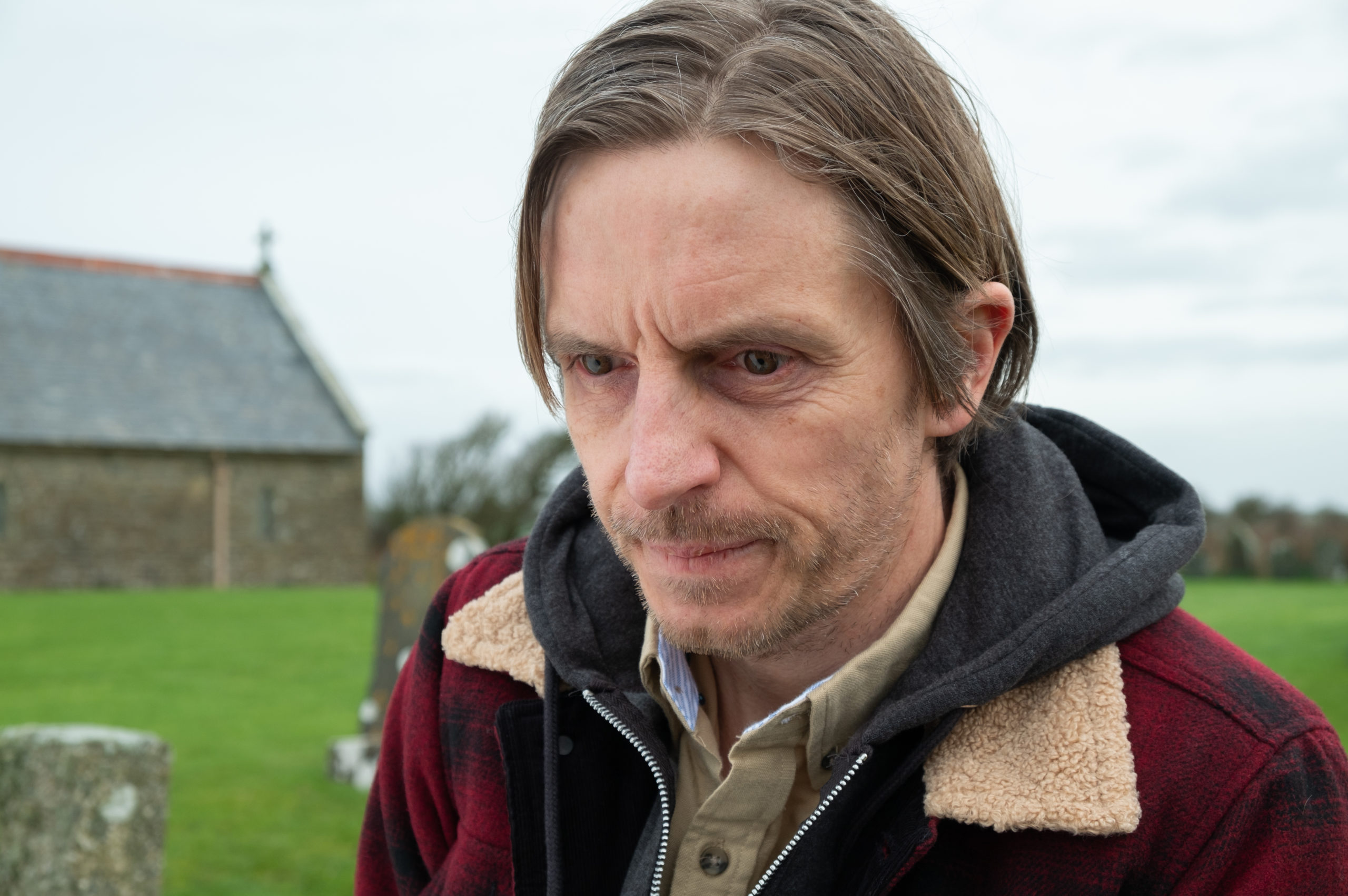 Actor Oliver Ryan as Pat and John Cooper's son, Andrew