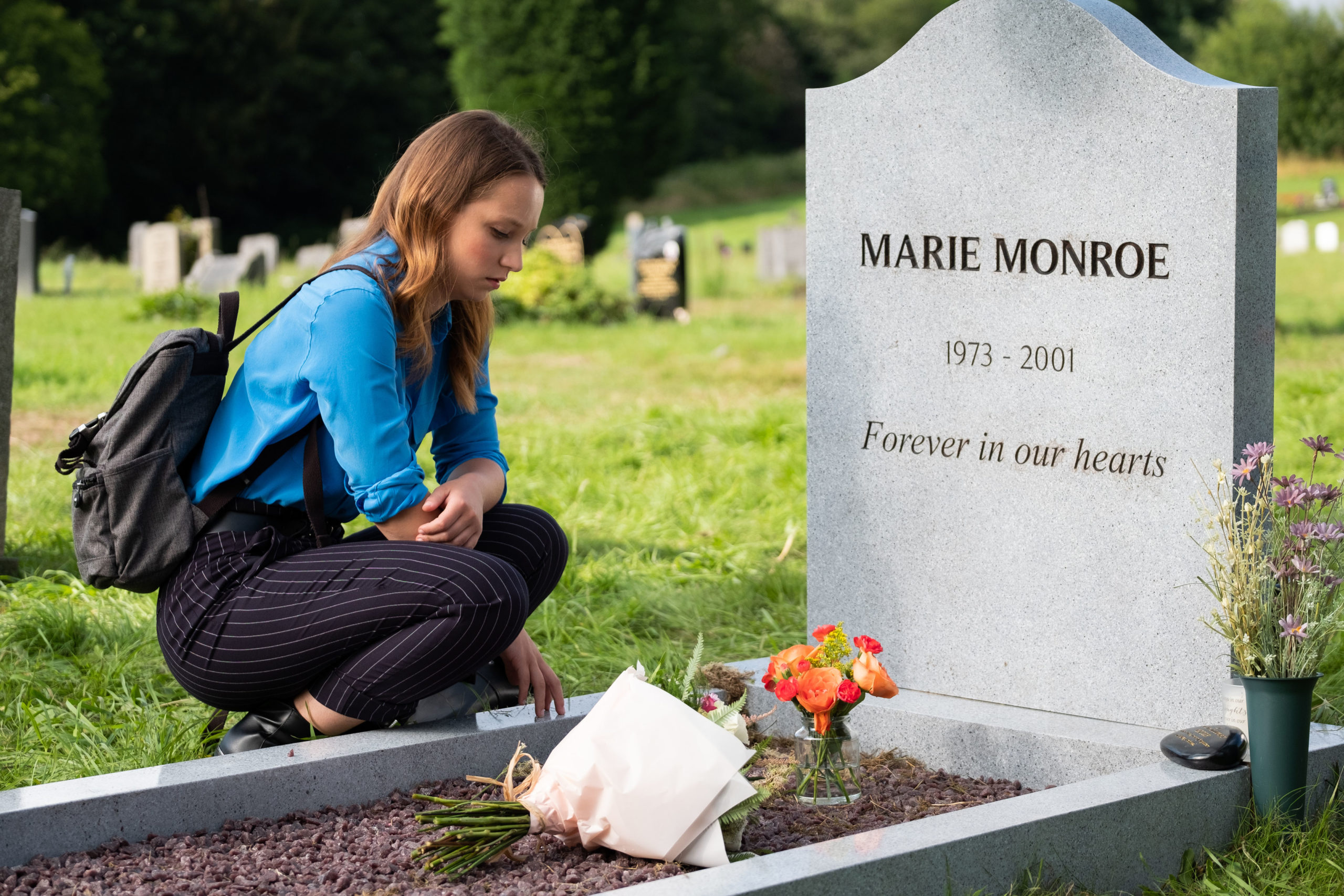 Emma at mum Marie's grave