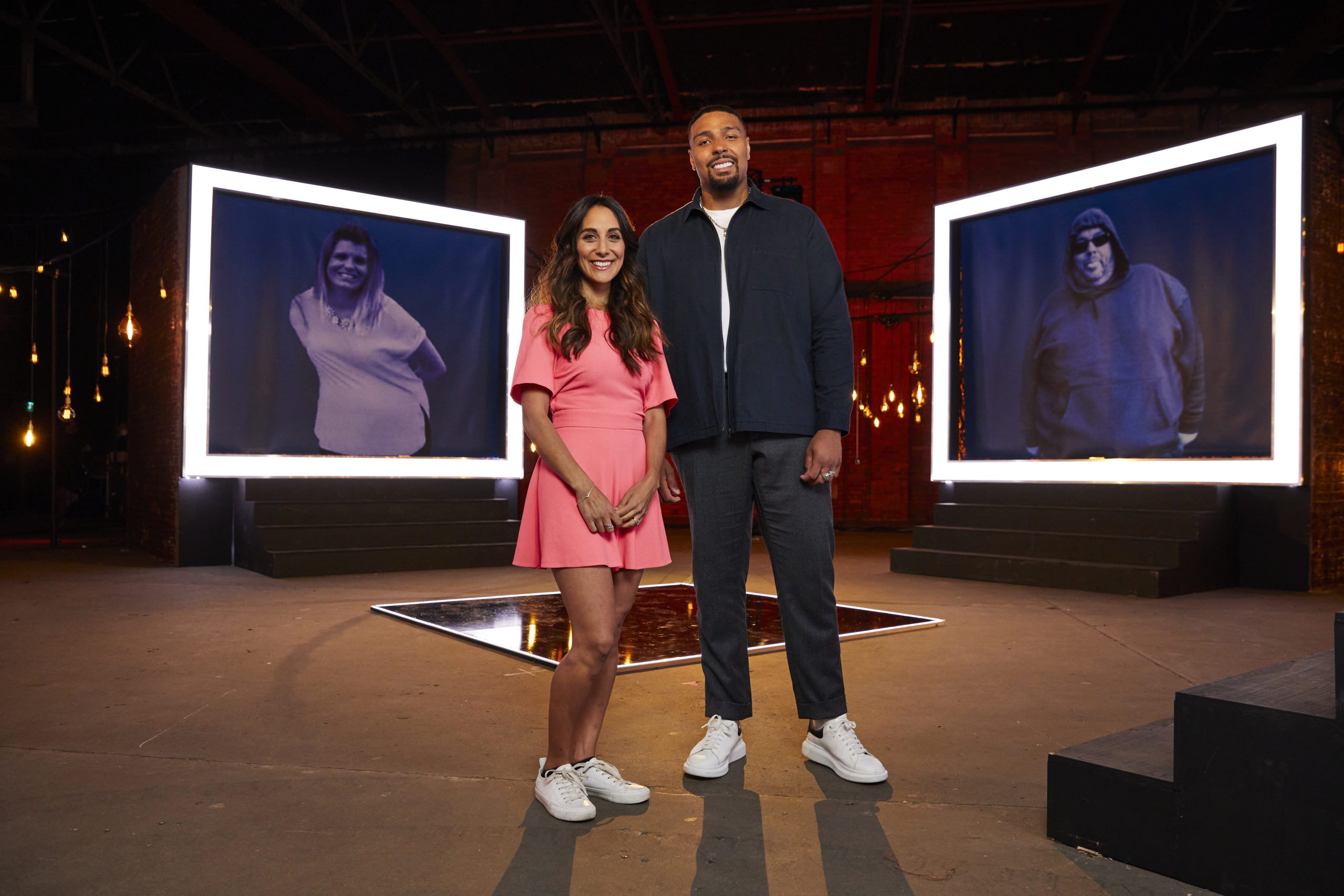Dr Sara Kayat and Ashley Banjo stand in front of their own before images on set of Lose Weight Like Me. .Behind on the screen shows the Diet Heros who will support the contributors through their weight loss journeys. .TX: Ch4