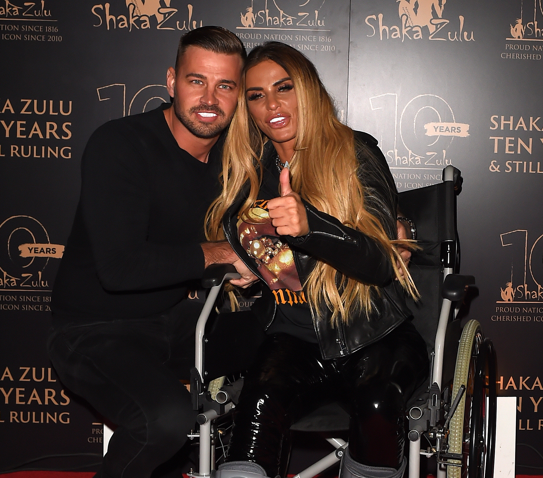 Katie Price in a wheelchair