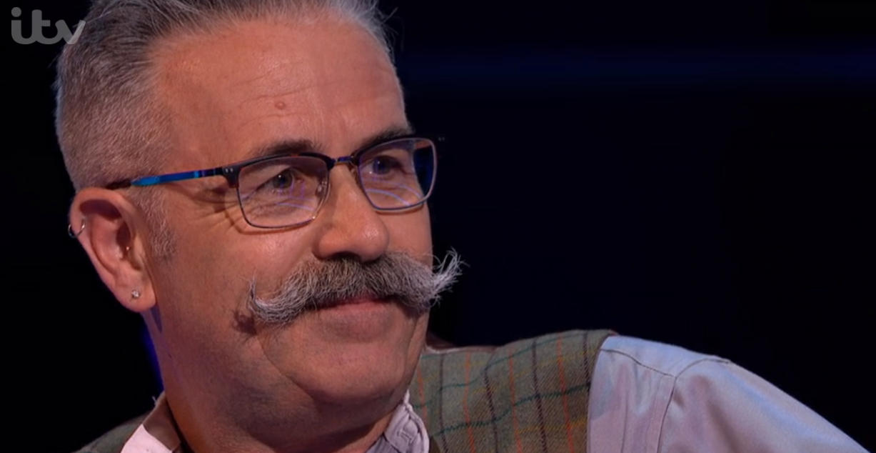 Contestant Justin looking at Jeremy Clarkson