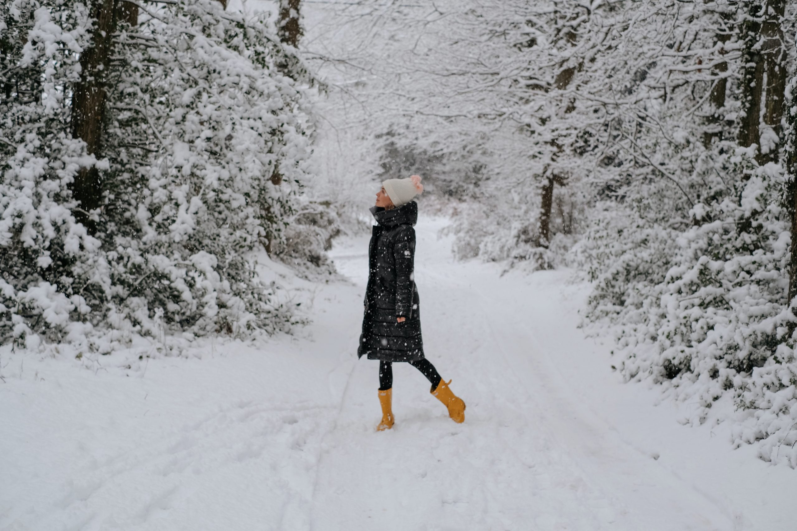 A woman standing in snow