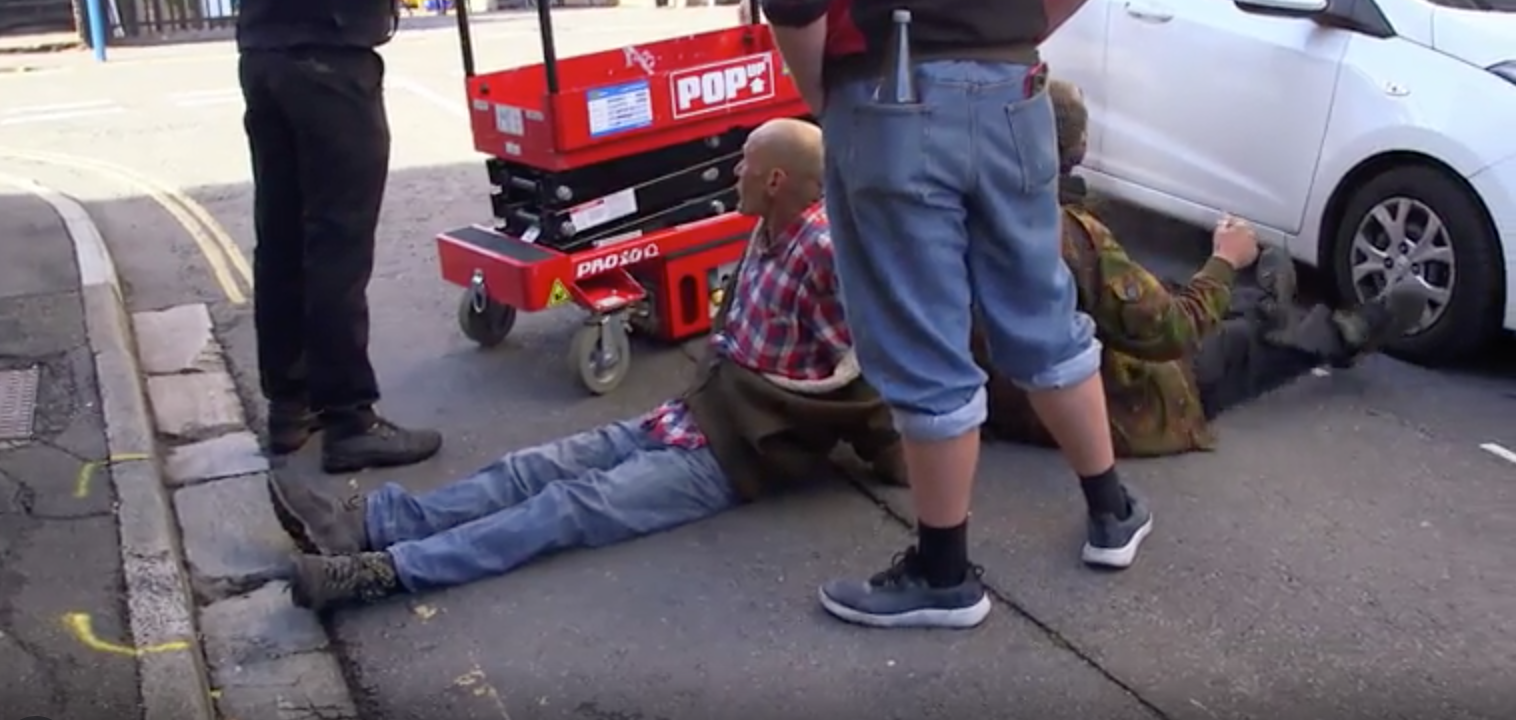 protesters blocking the lift in Nightmare Tenants, Slum Landlords
