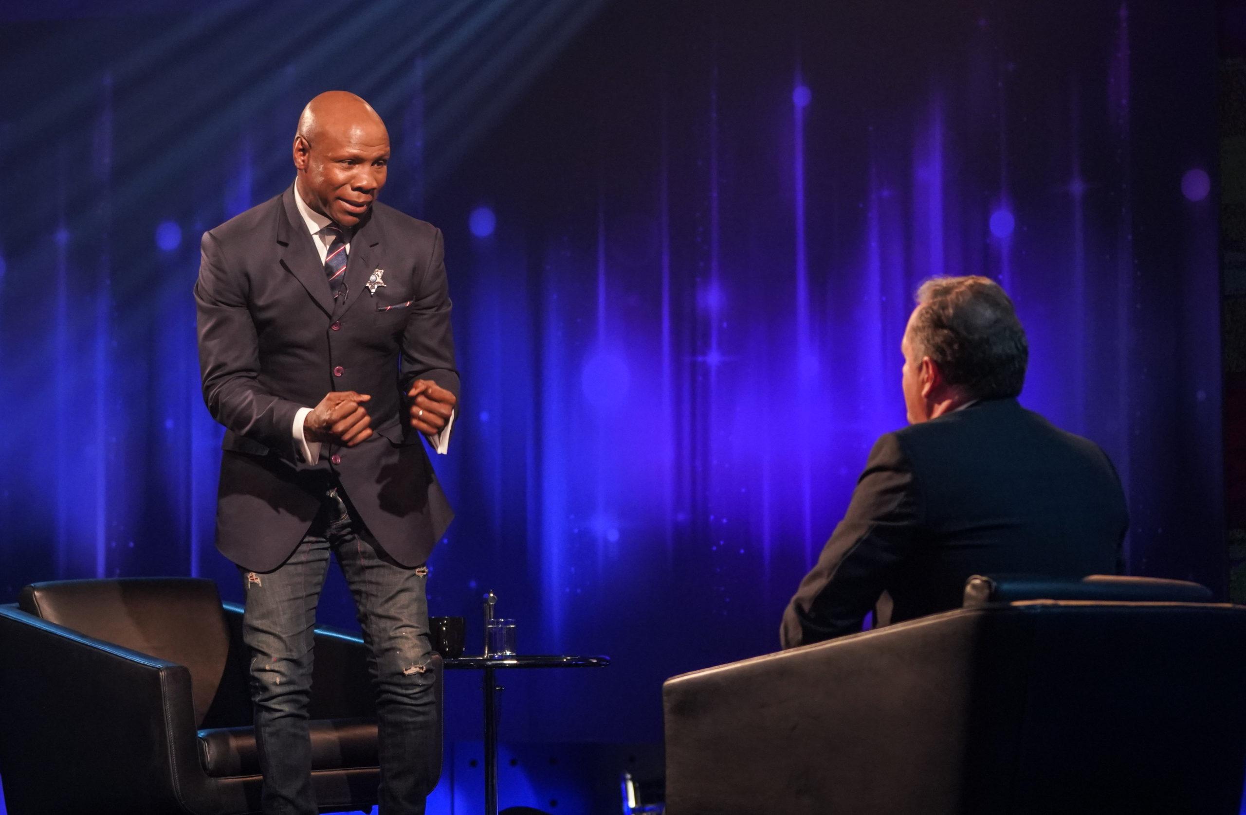 Chris shows Piers Morgan some of his boxing moves on Life Stories (Credit: ITV1)