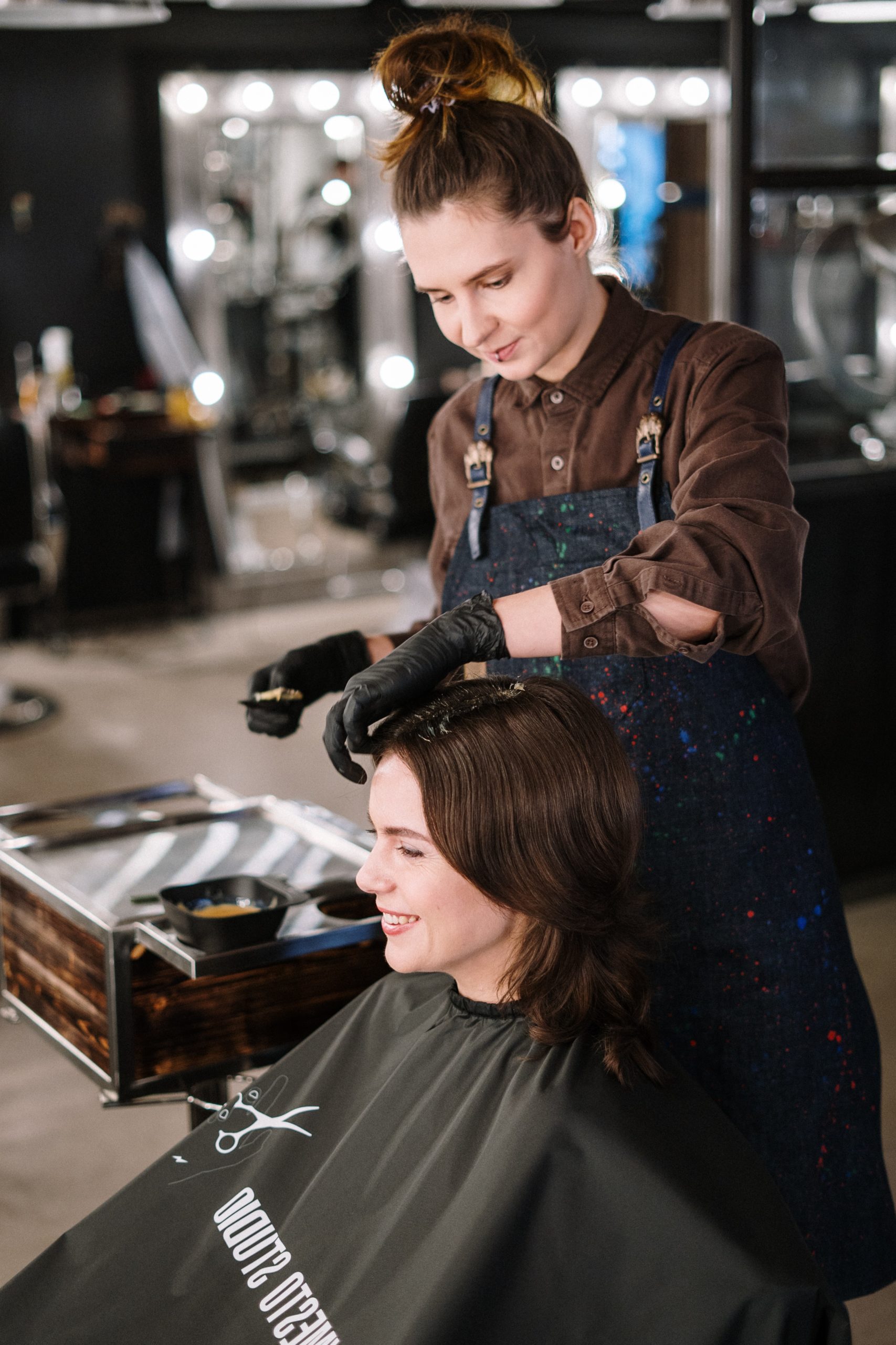 woman getting hair done