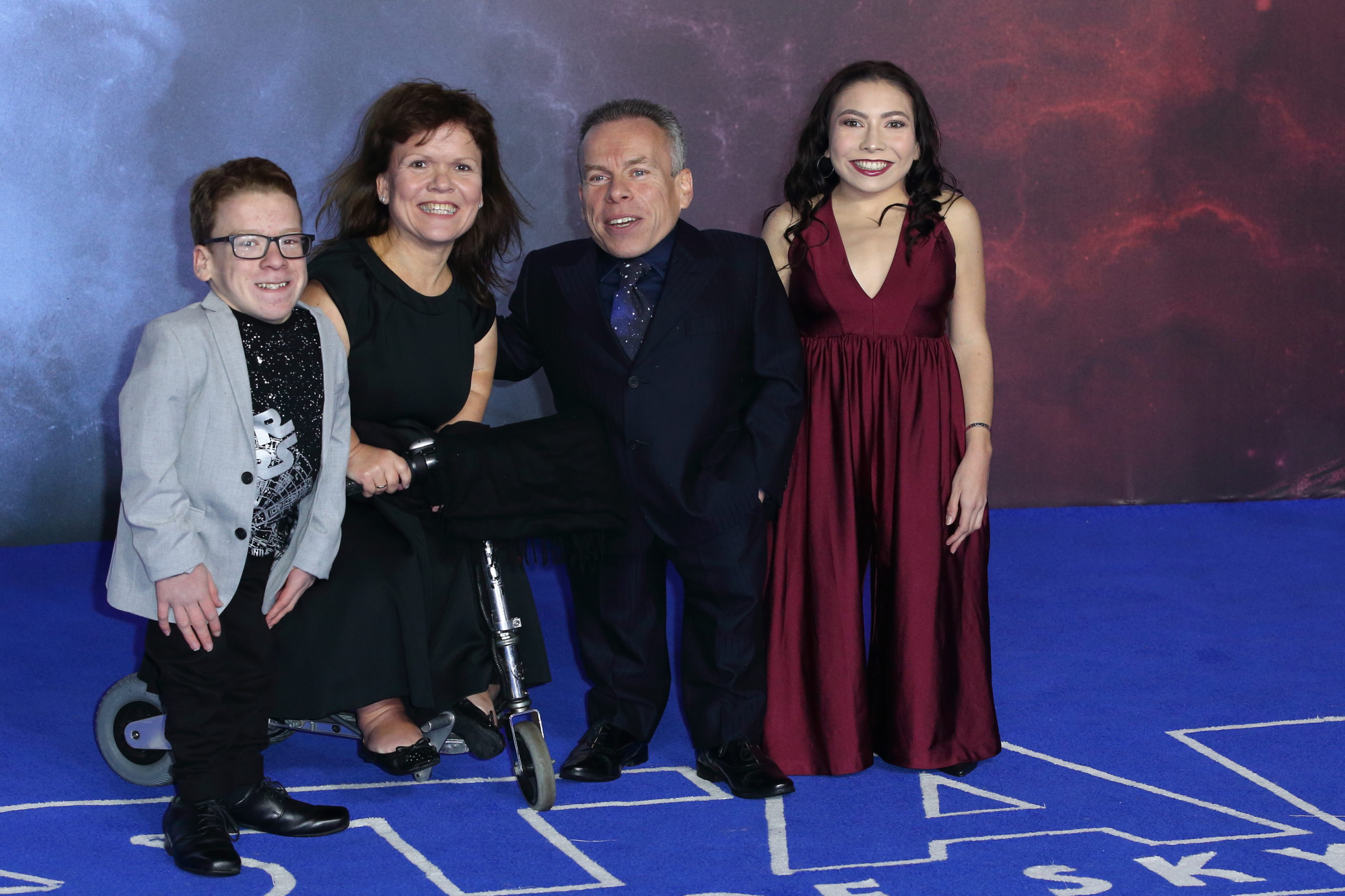 Warwick Davis and his family, including twi children