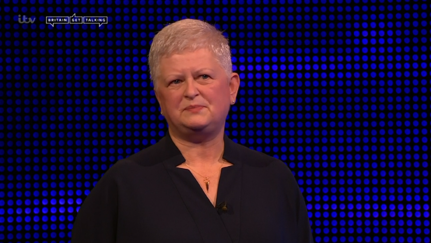 Jacquie speaking to bradley walsh on the chase