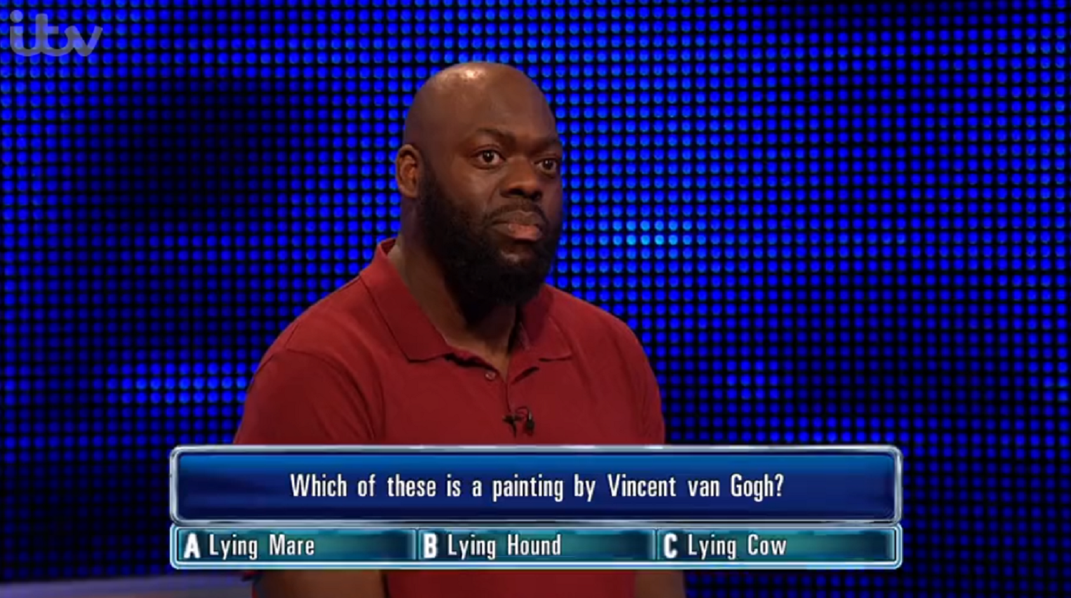 Michael, standing with bradley walsh on The chase