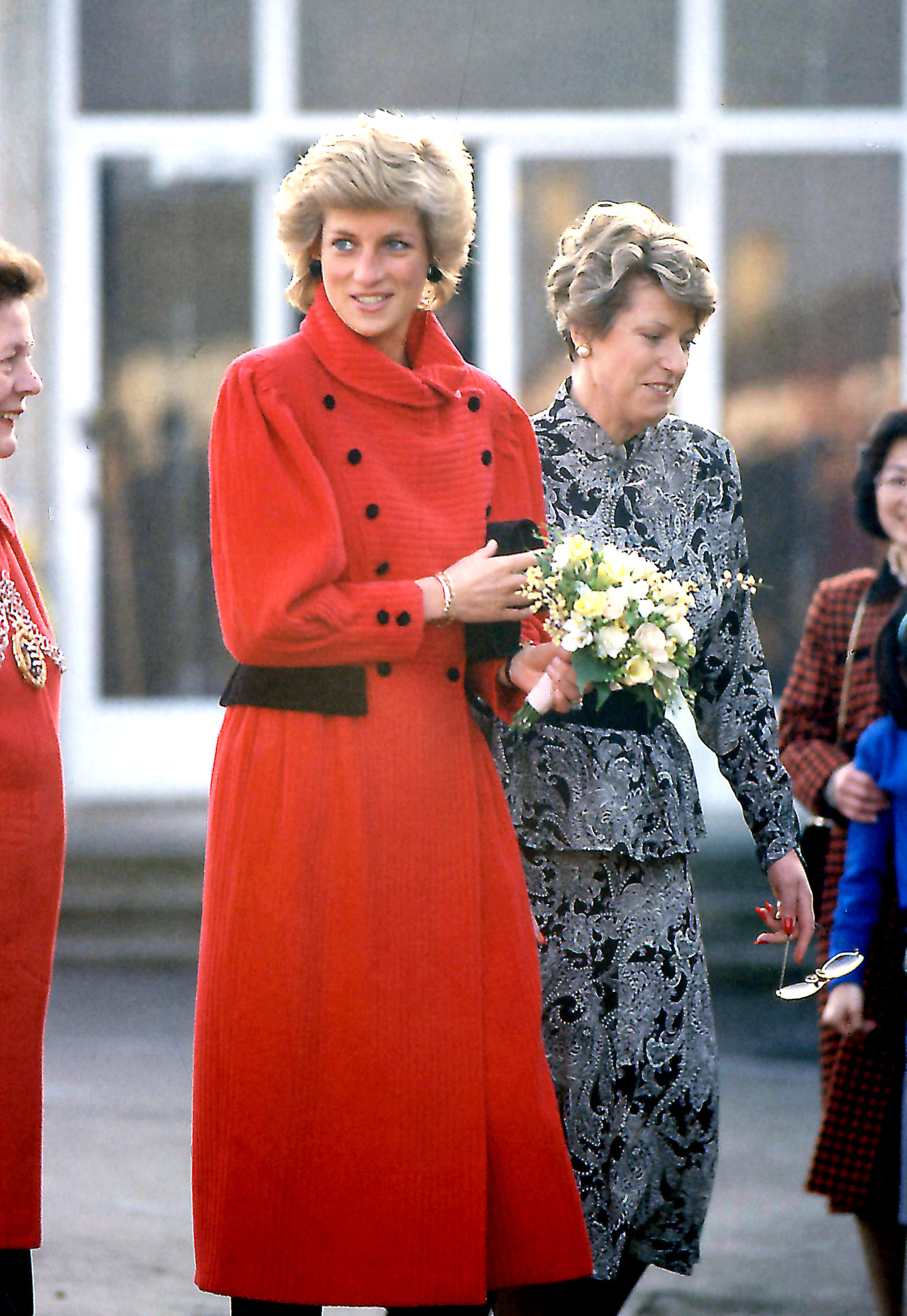 princess Diana in a red coat