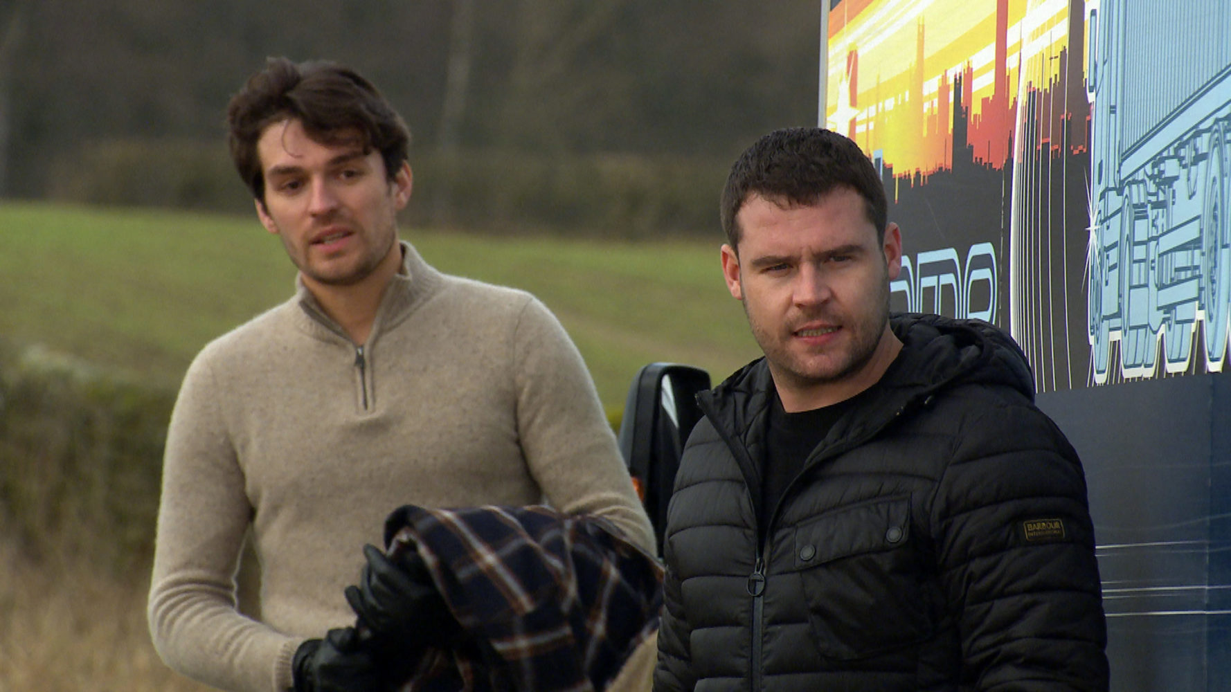 Aaron Dingle [DANNY MILLER] is reluctant to help Mack Boyd [LAWRENCE ROBB] load up the dodgy TVs but eventually agrees. When the police arrive on the scene, Mack scarpers leaving Aaron to face the music