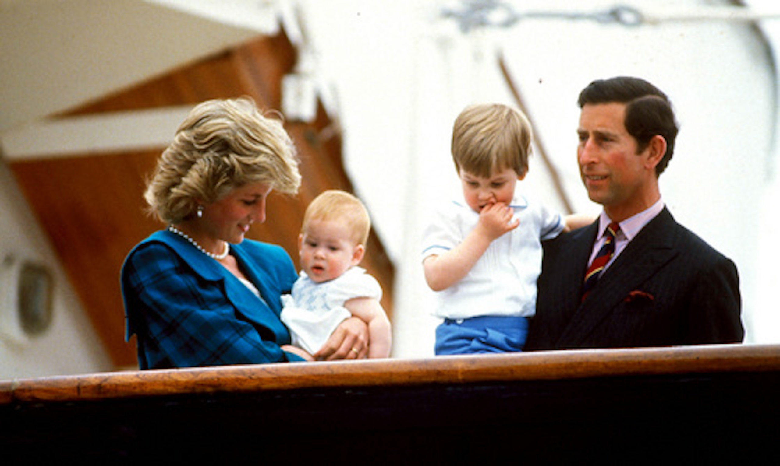 Royal family members Princess Diana, Prince Charles, Prince William and Prince Harry