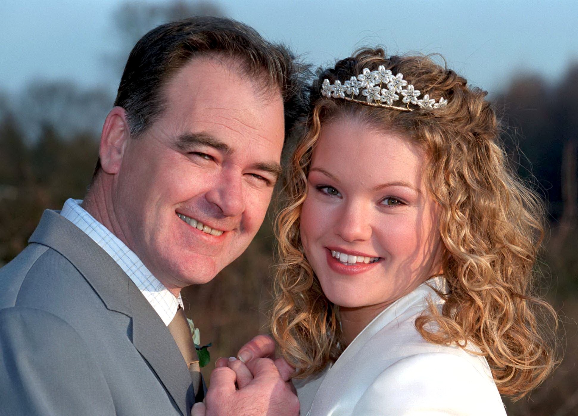 Terry Woods and new wife Dawn Woods beam for the camera