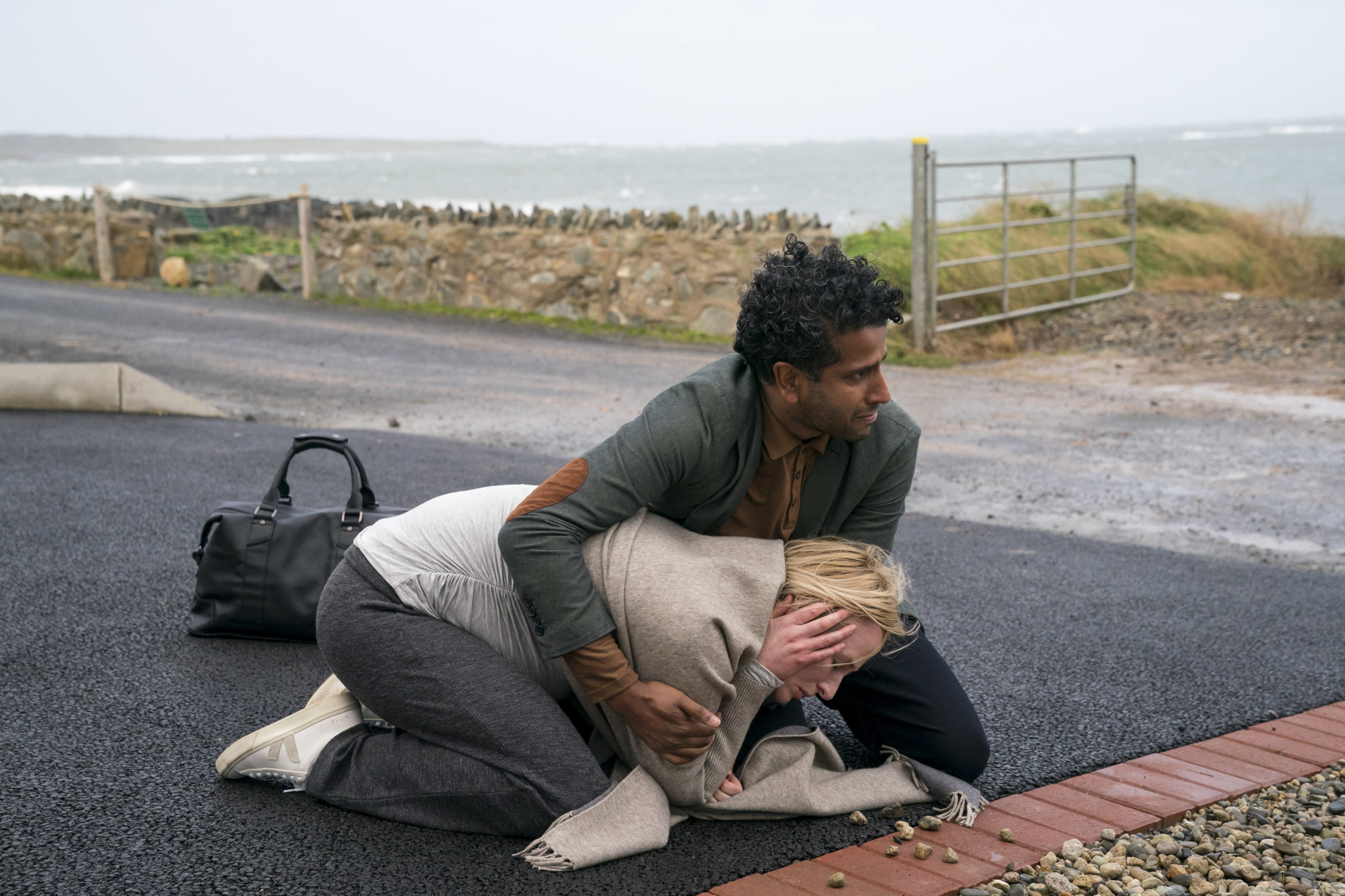 Genevieve O'Reilly as Rosie and Prasanna Puwanarajah as David in Three Families (Credit: BBC One)