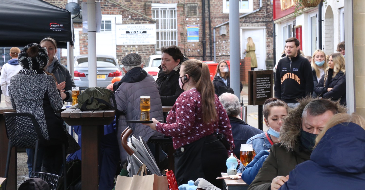 People drinking outdoors