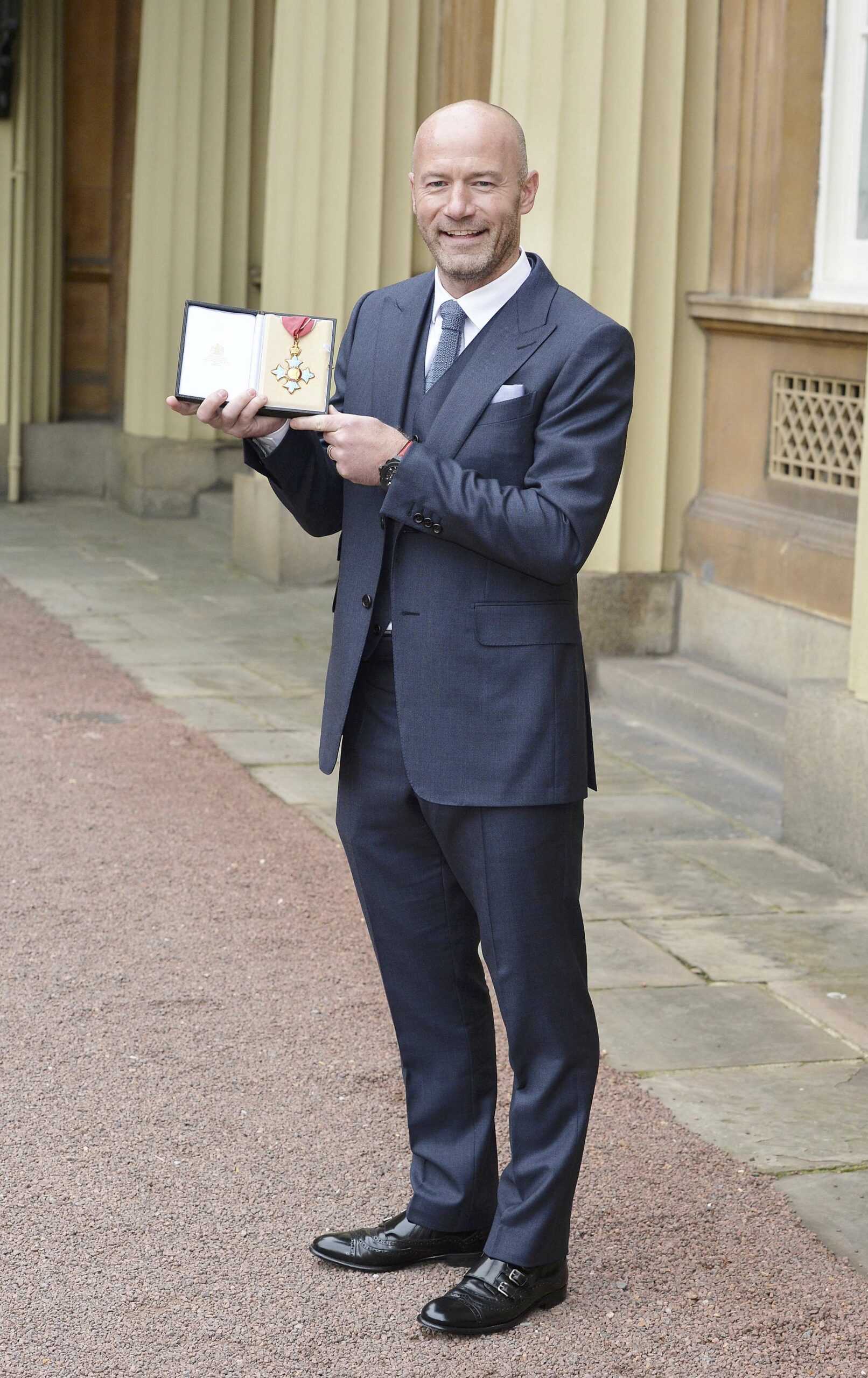 Alan Shearer poses with his CBE 