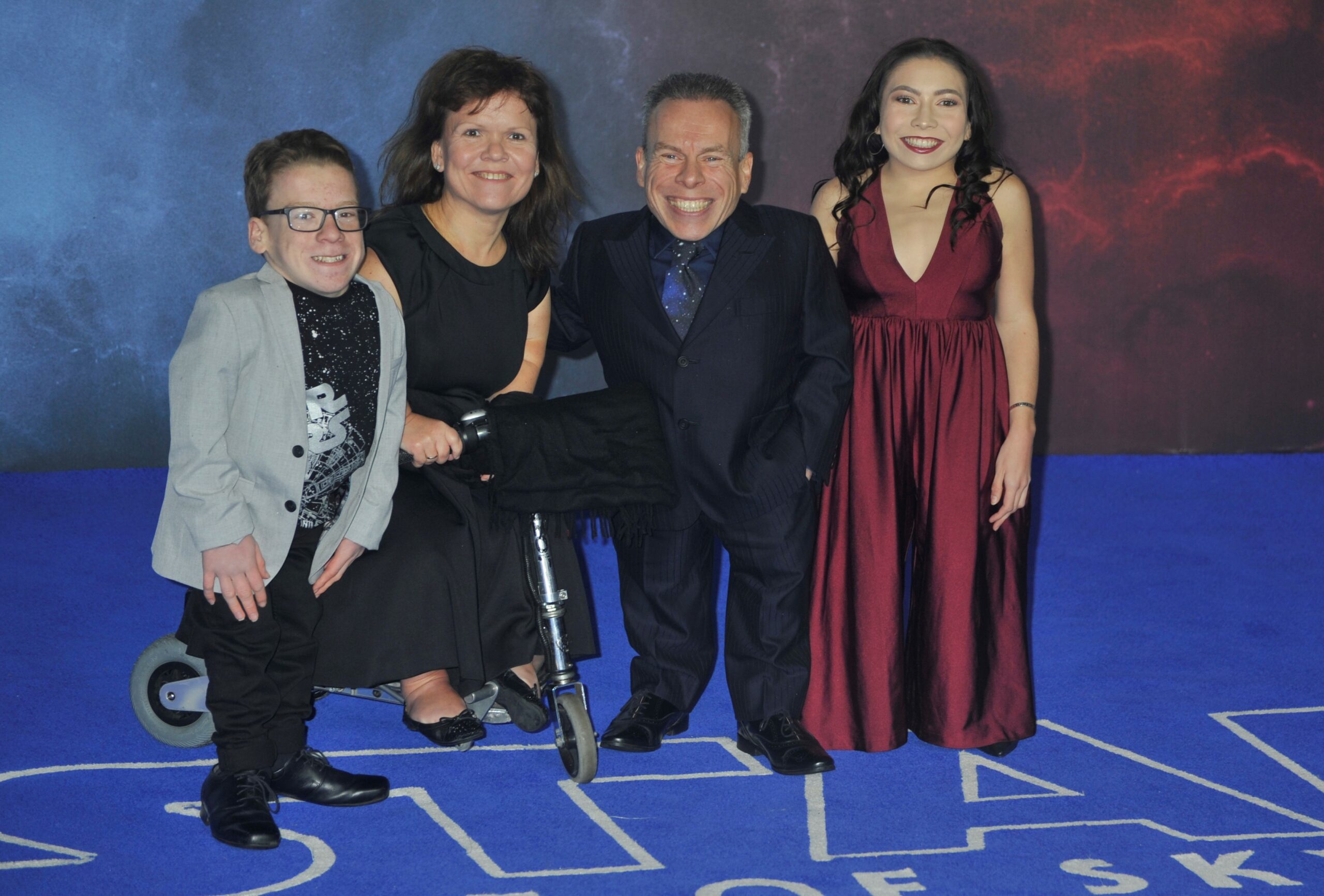 Warwick Davis and family