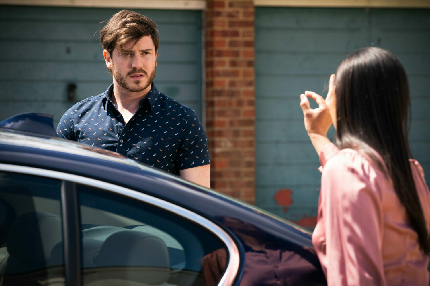 Chelsea in EastEnders finds an earring in Gray's car
