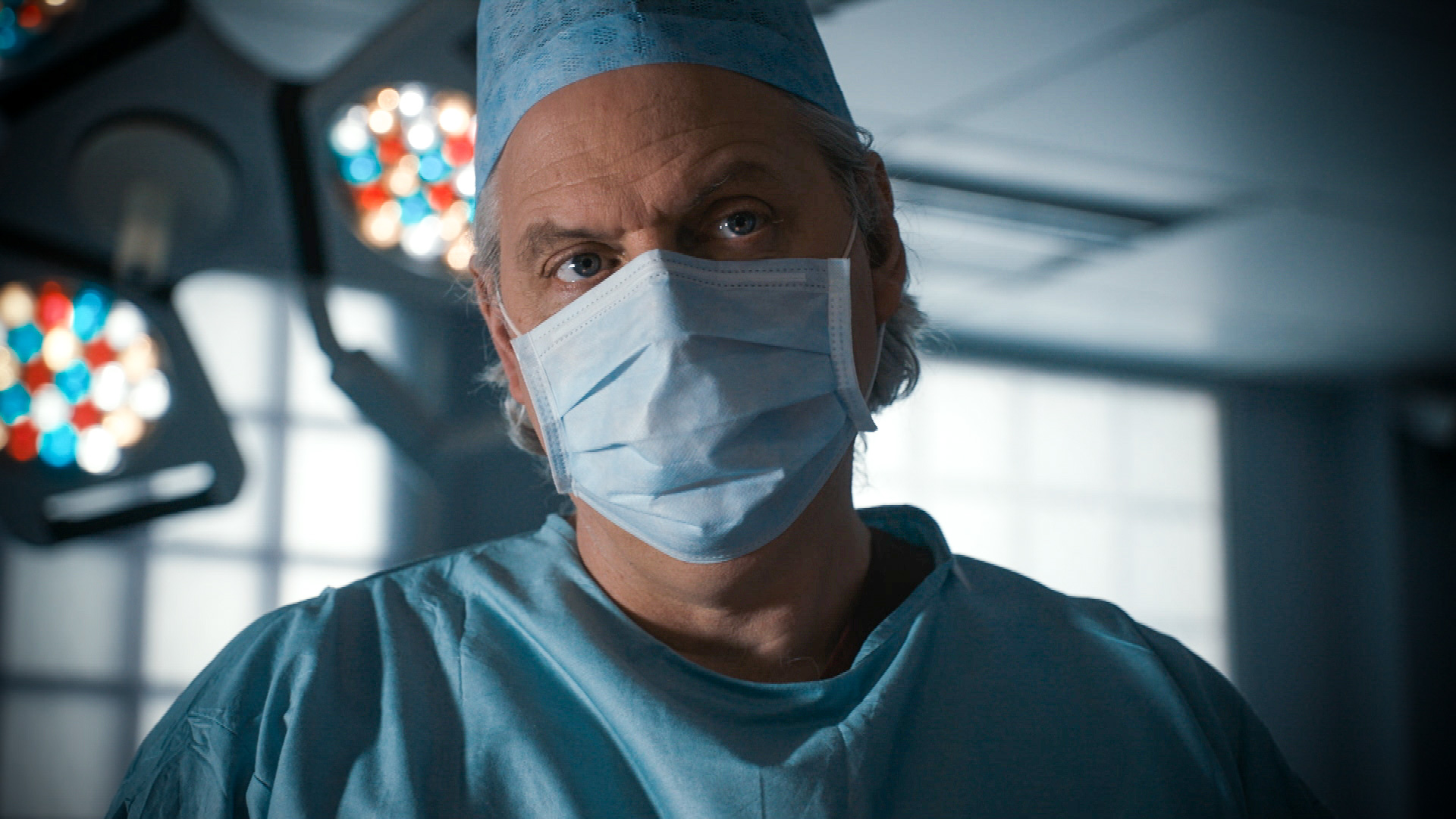 Holby City Sacha in scrubs