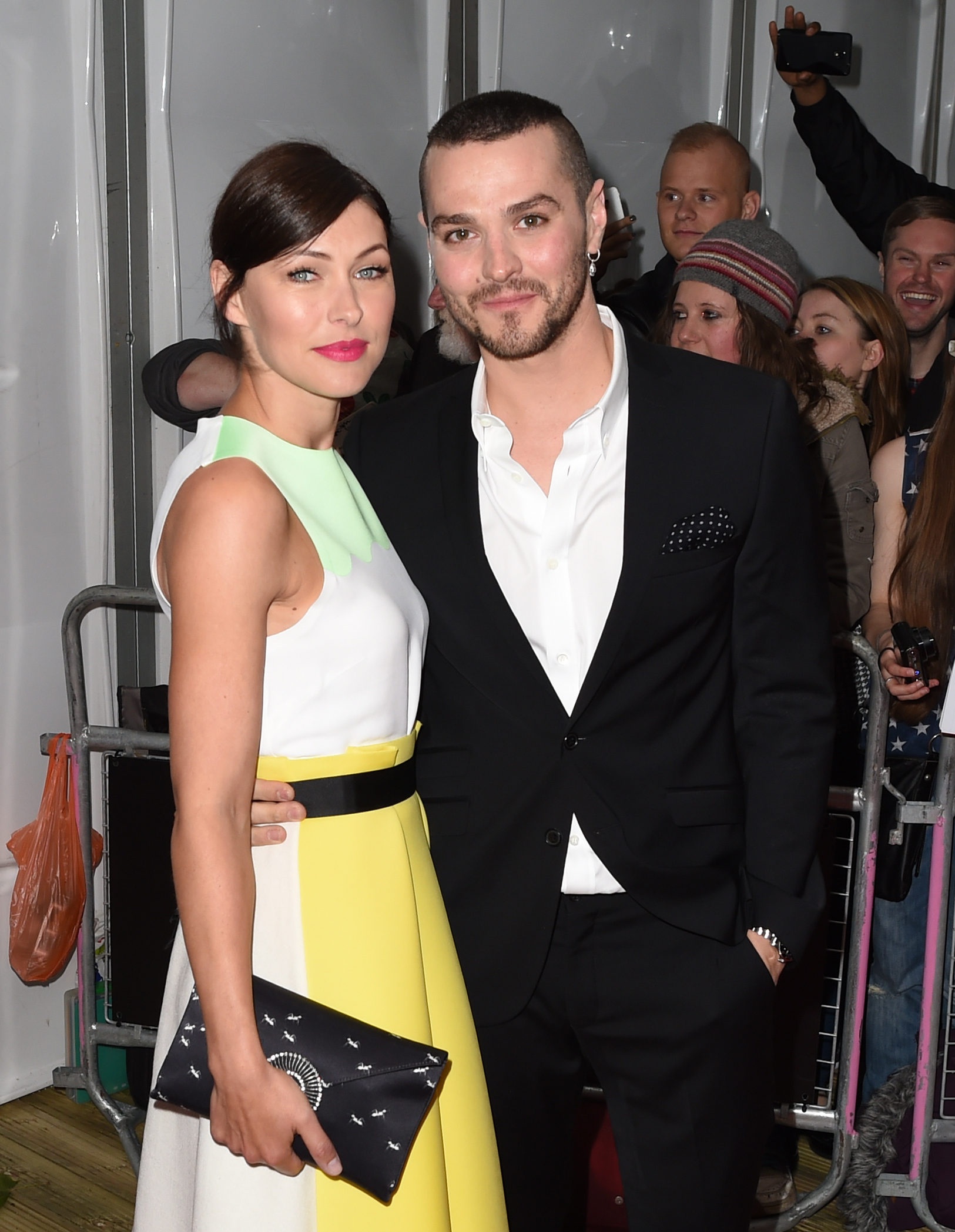 Emma Willis and Matt Willis pose on the red carpet
