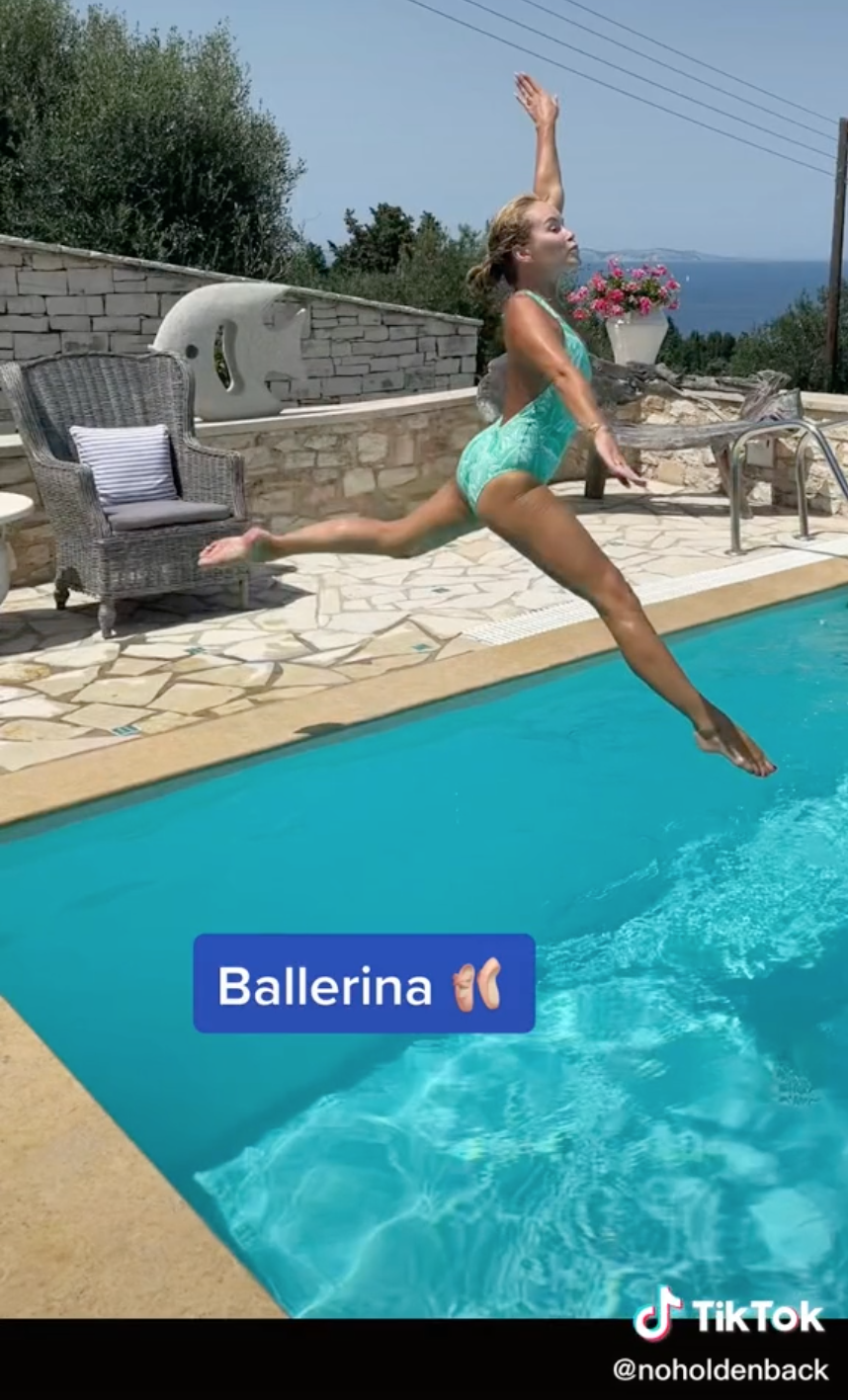 Amanda Holden jumps into her swimming pool in a ballerina style