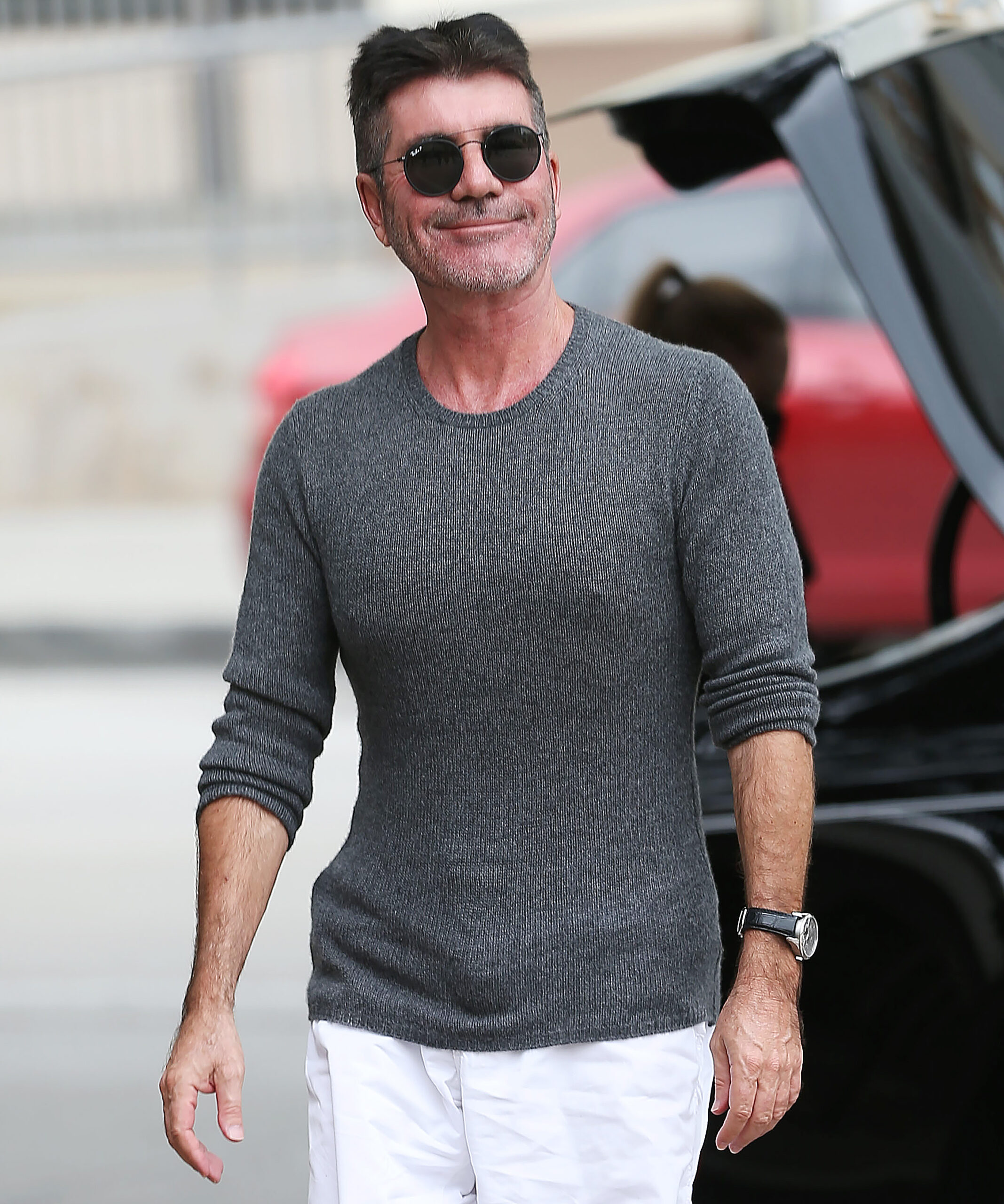 Simon Cowell smiles as news of The X Factor cancellation