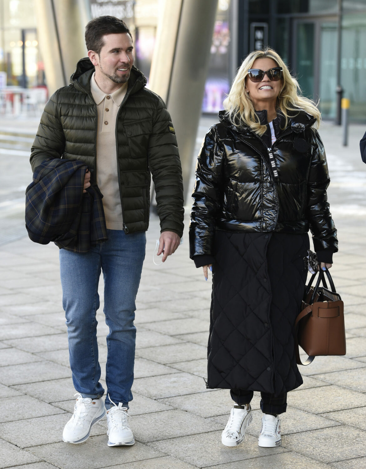 kerry katona and fiance ryan mahoney walking down the street