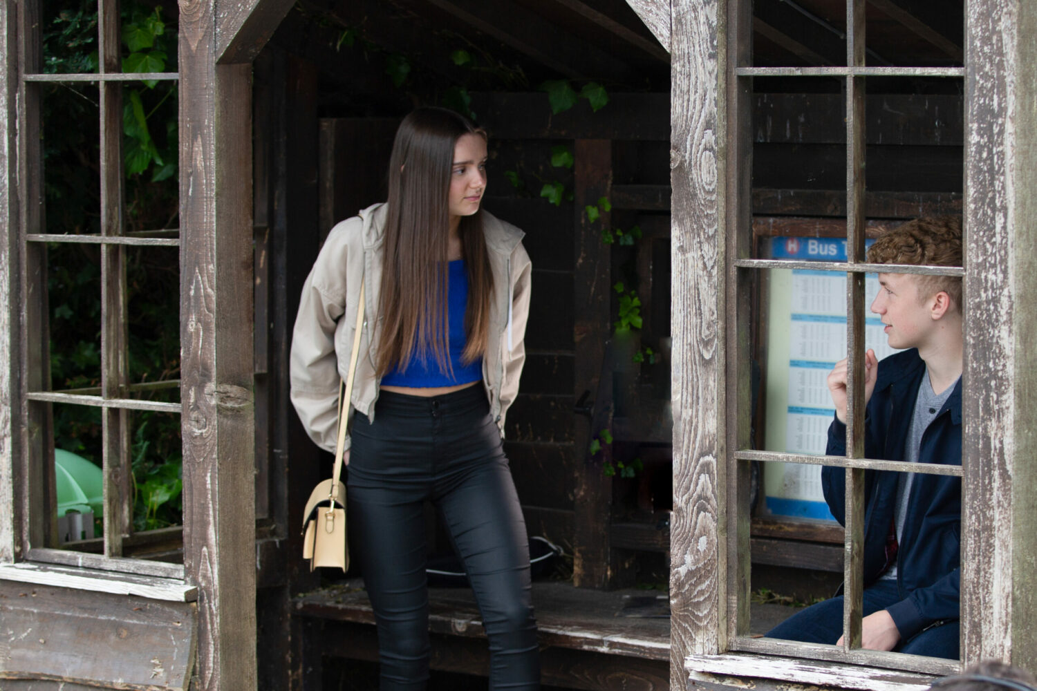 Emmerdale Chloe: Sarah and Noah at the village bus stop 