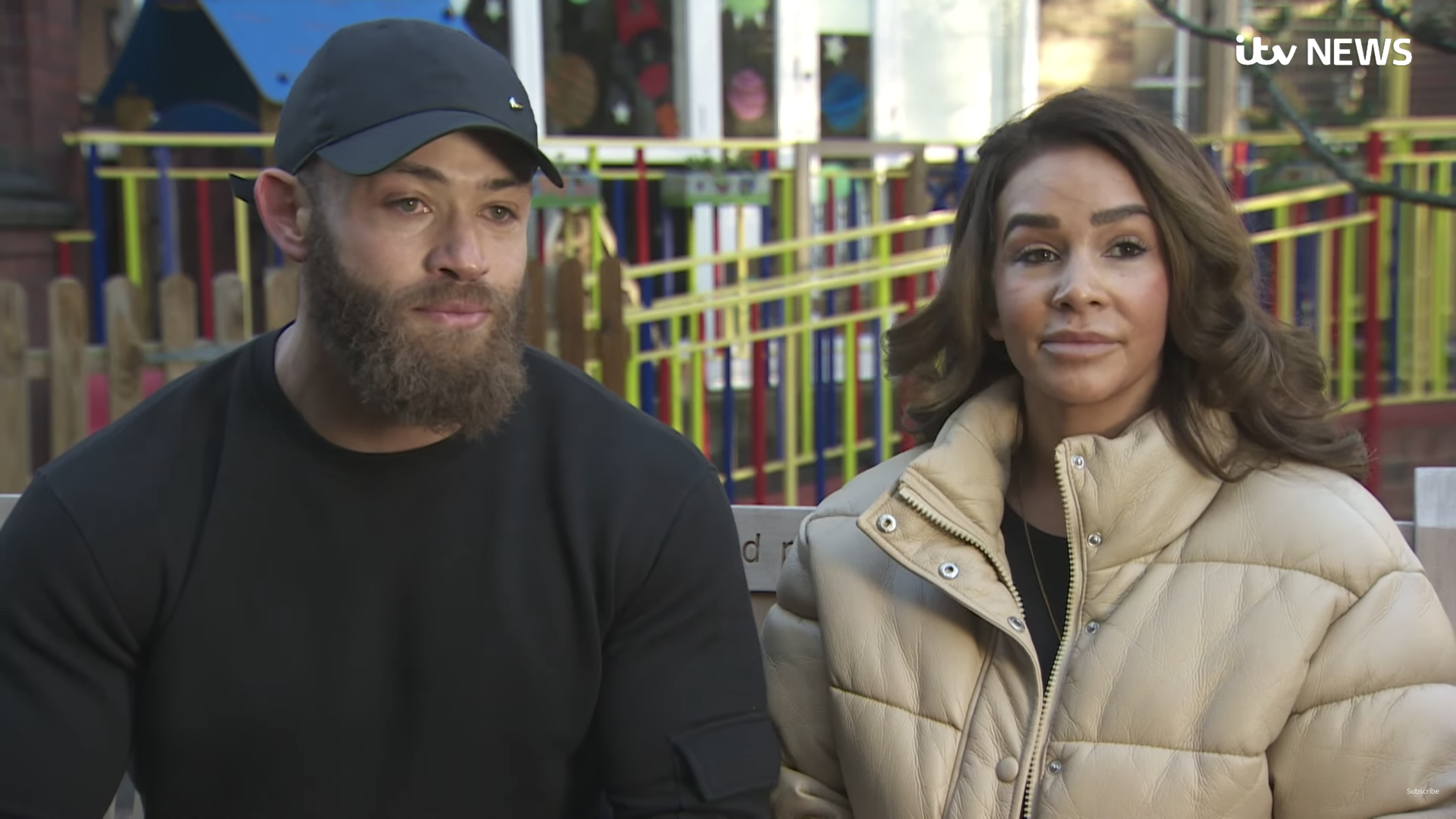 Ashley Cain in a black sweatshirt and capand Safiyya Vorajee in a beige puffer coat on a bench talking about daughter Azaylia