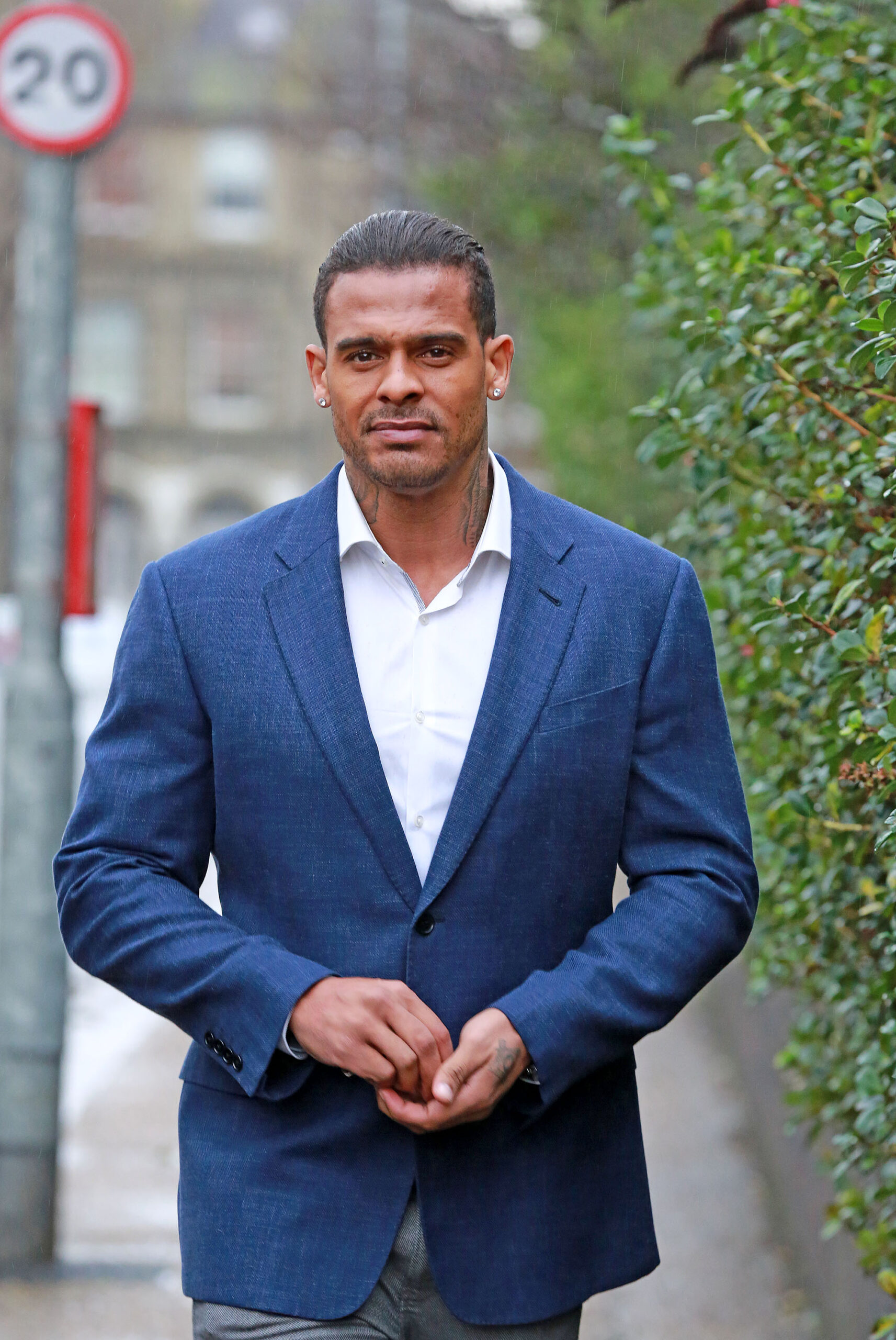 George Kay at Hove court in a blue suit and white shirt