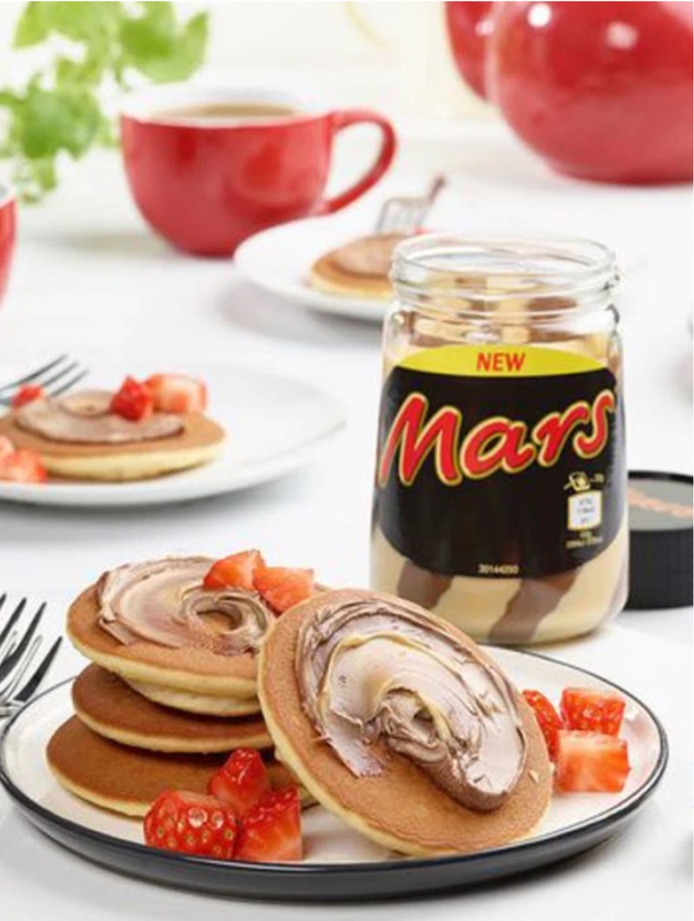 New Mars bar flavour spread in a jar with pancakes