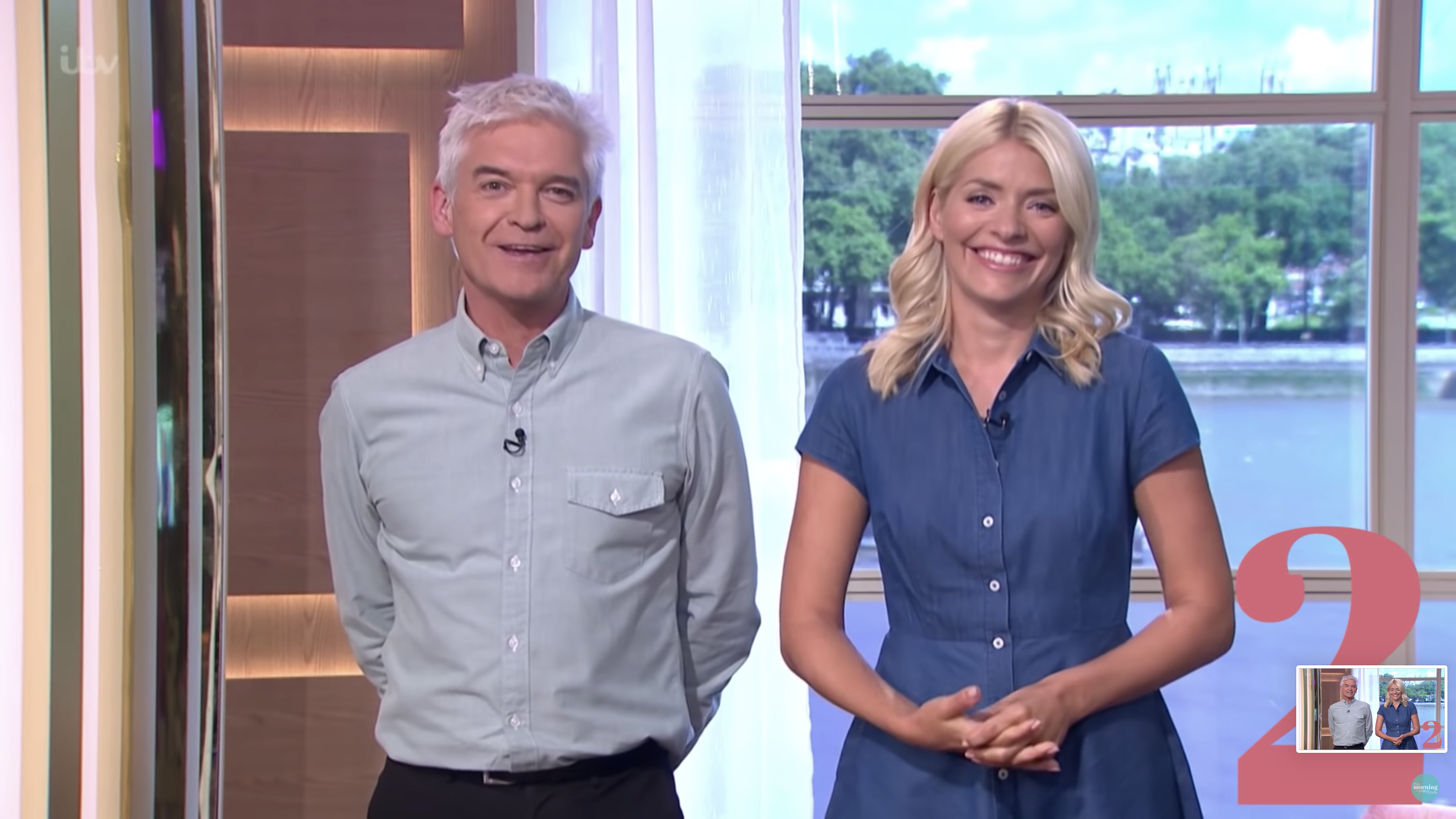 Holly Willoughby and Phillip Schofield laughing as they host This Morning