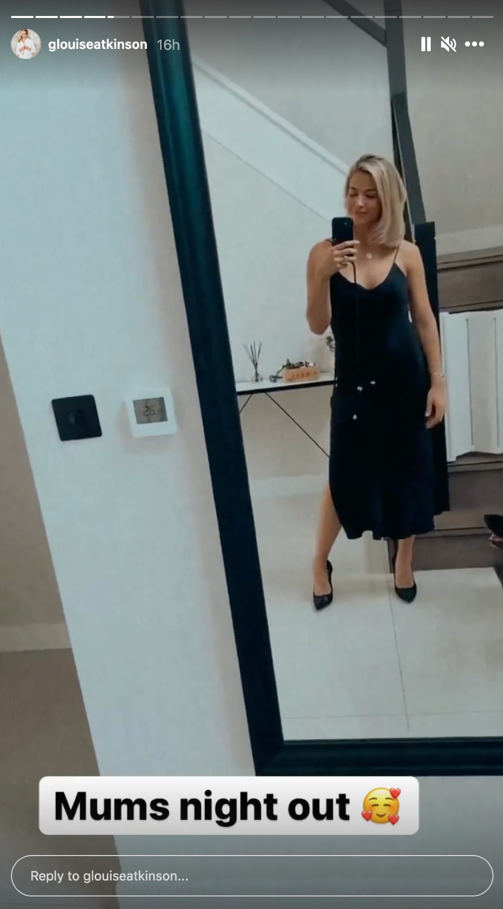 Gemma Atkinson poses in a black strappy midi dress in the mirror on Instagram