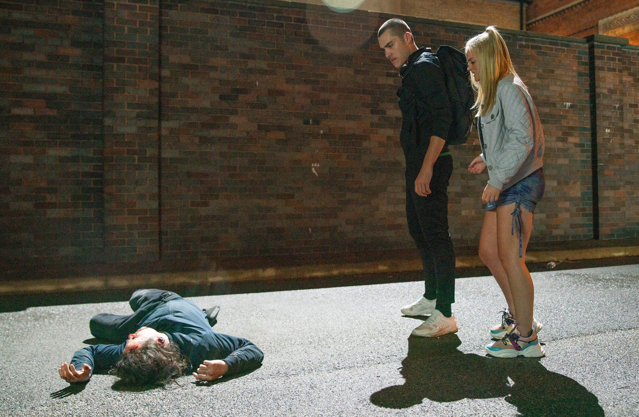 Corey and Kelly stand over Seb's lifeless body in Coronation Street