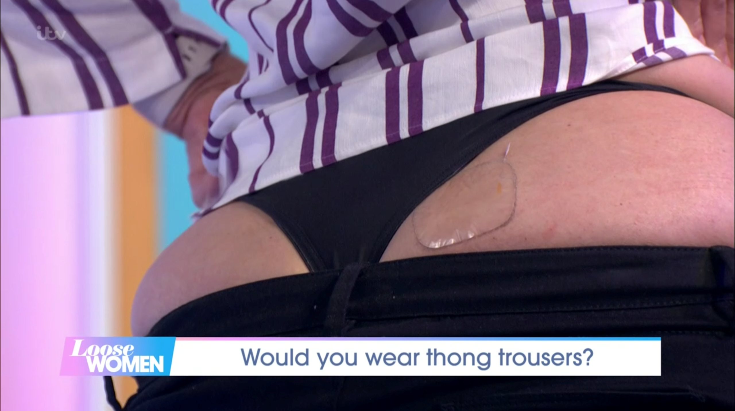 Nadia Sawalha flashes bum on Loose Women