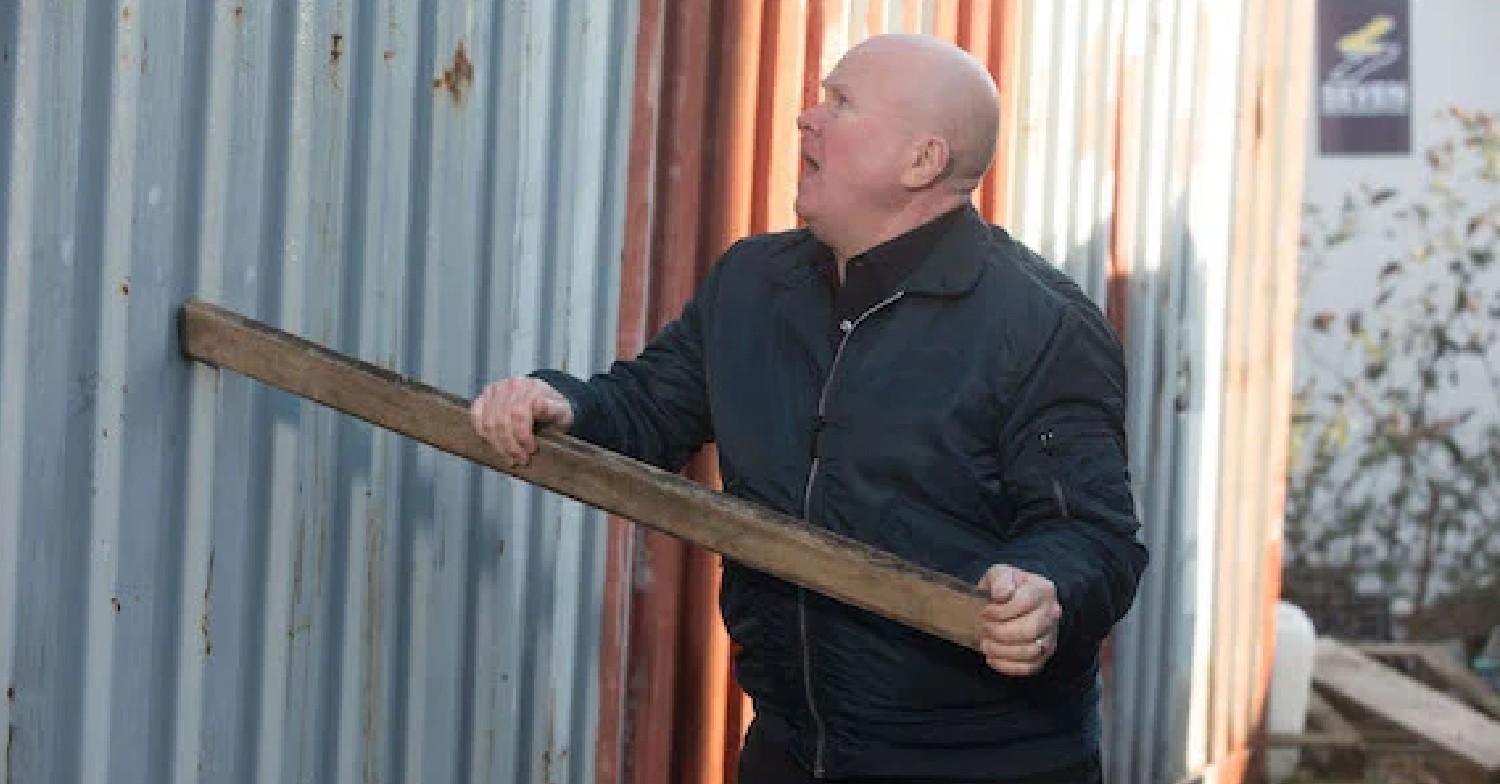 EastEnders Phil bangs on container doors looking for Louise