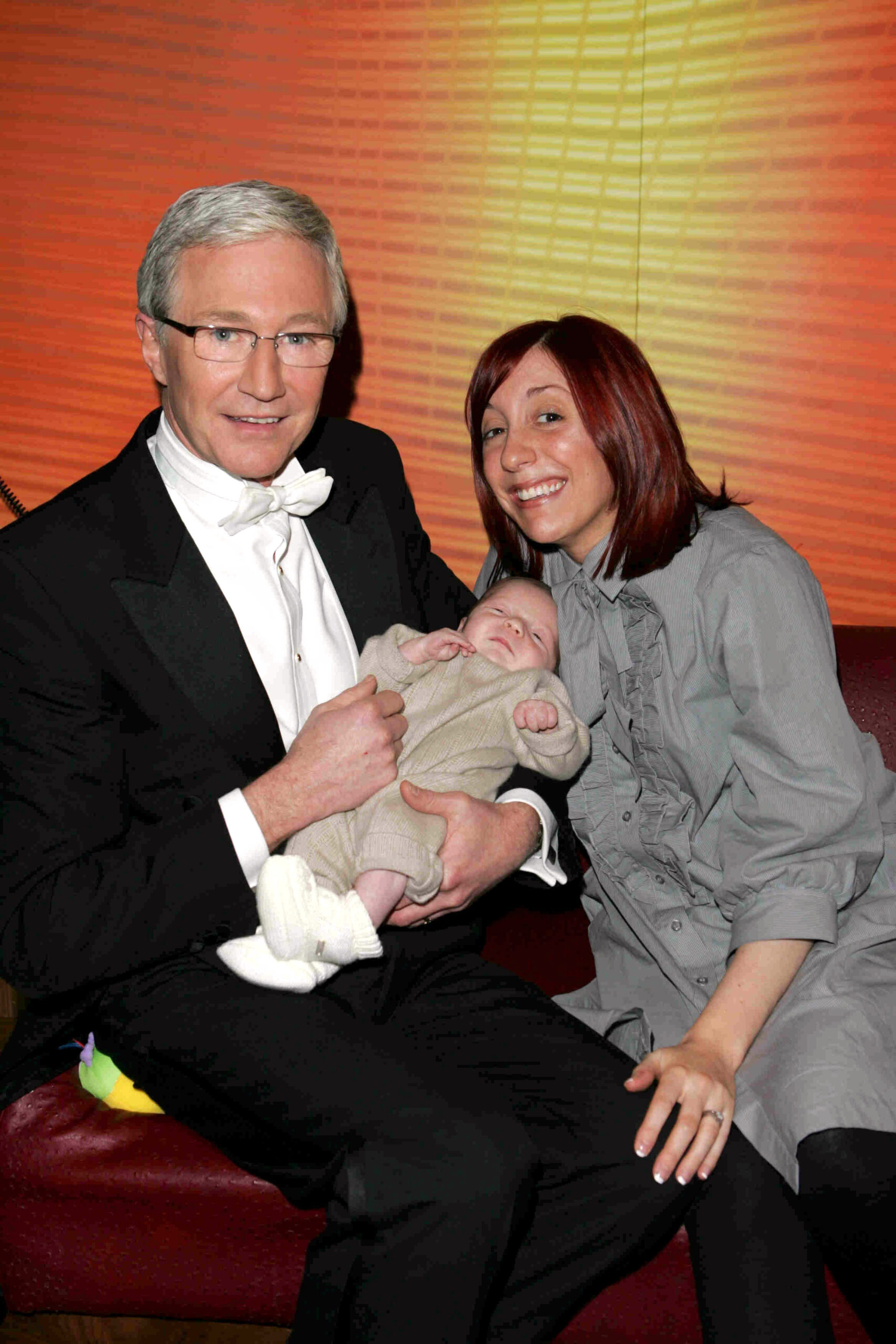 Paul O'Grady and his daugther with grandchild smiling