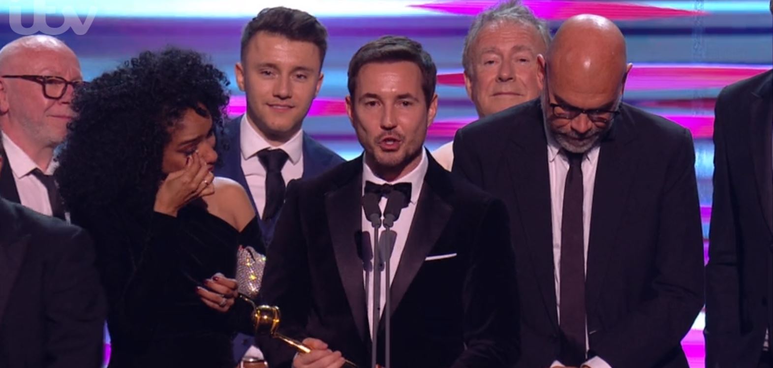 Martin Compston and wife on stage at NTAs