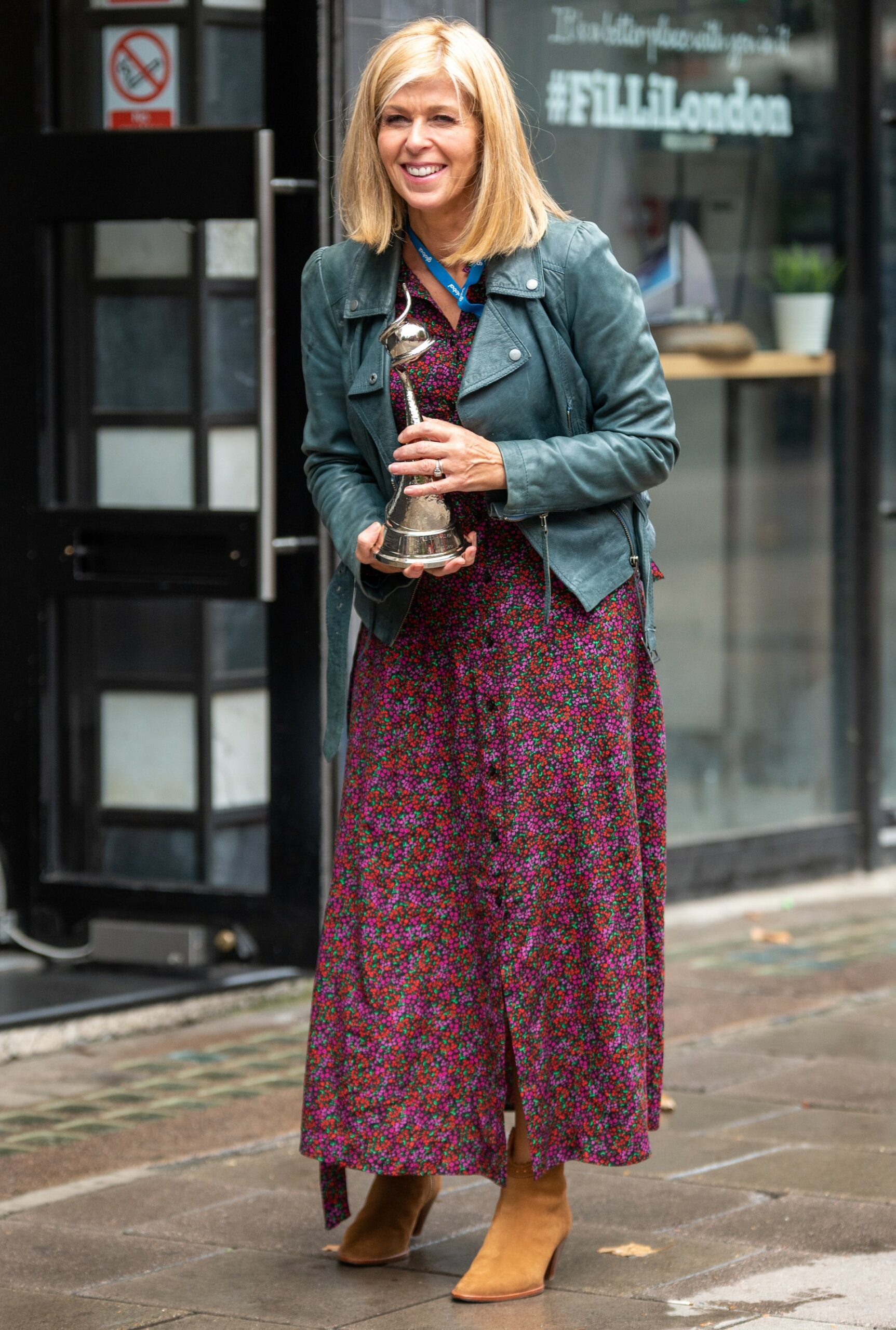 Kate Garraway smiles outside Global studios