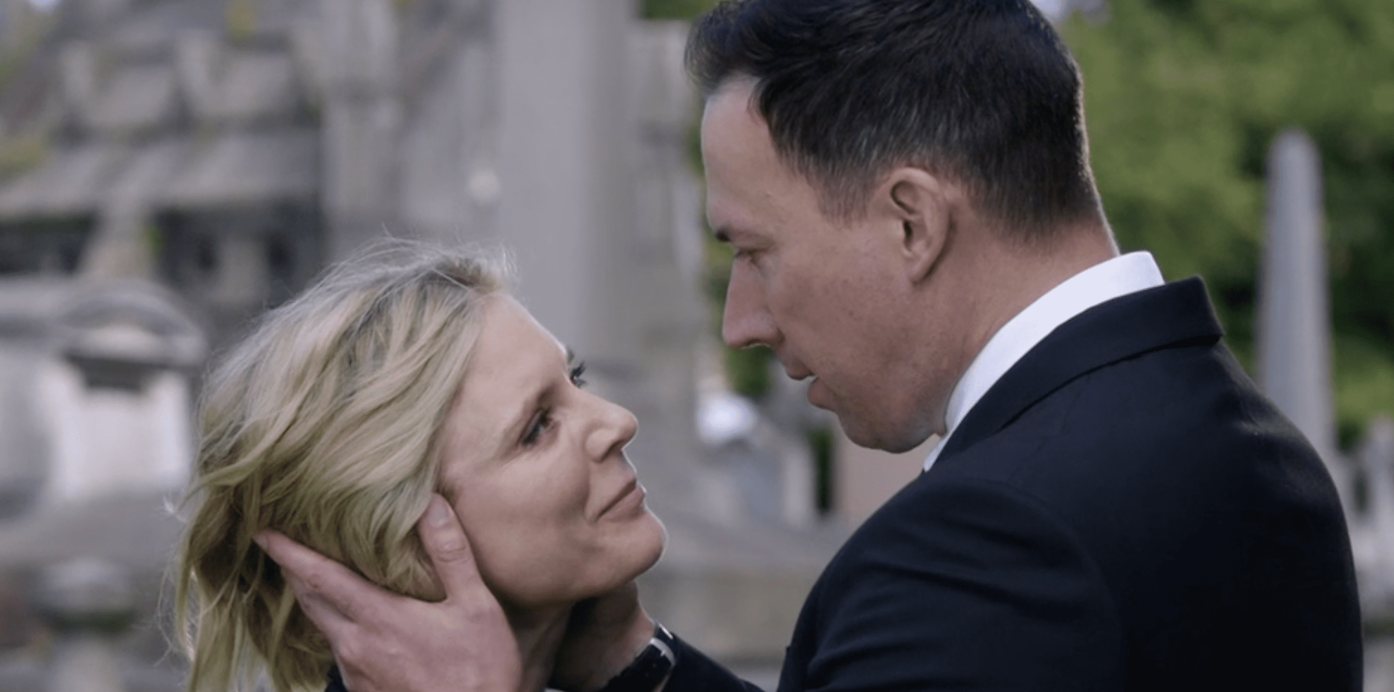 Nikki Alexander and boyfriend Jack Hodgson share a passionate moment at a funeral